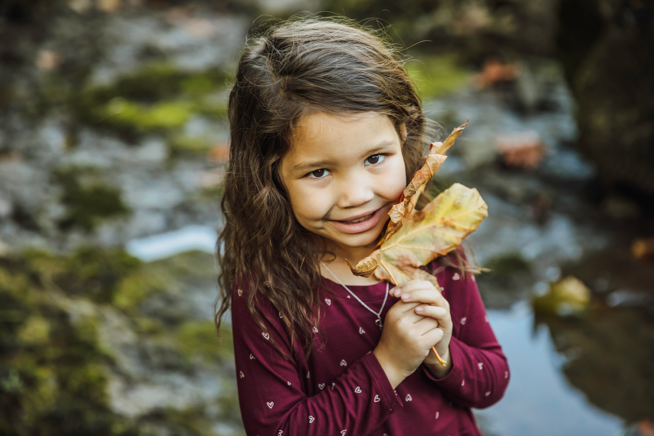 Family of three photography session at Snoqualmie Falls by James Thomas Long Photography