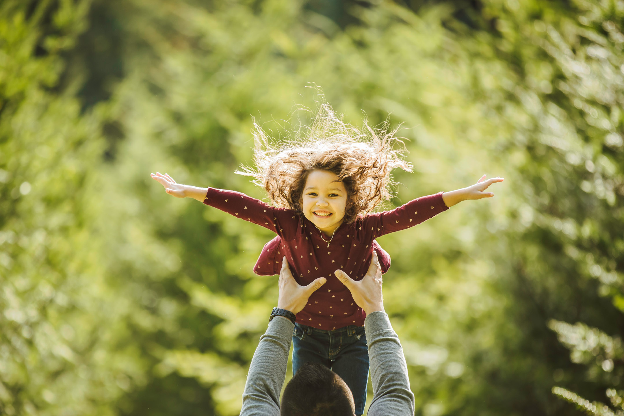 Family of three photography session at Snoqualmie Falls by James Thomas Long Photography