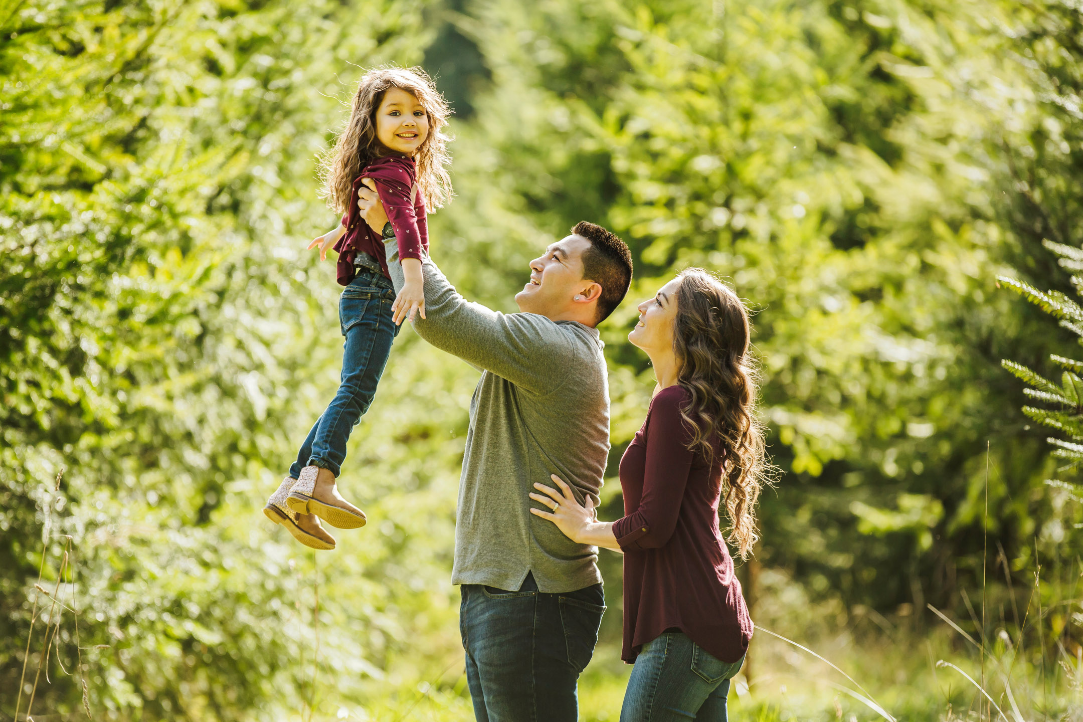 Family of three photography session at Snoqualmie Falls by James Thomas Long Photography