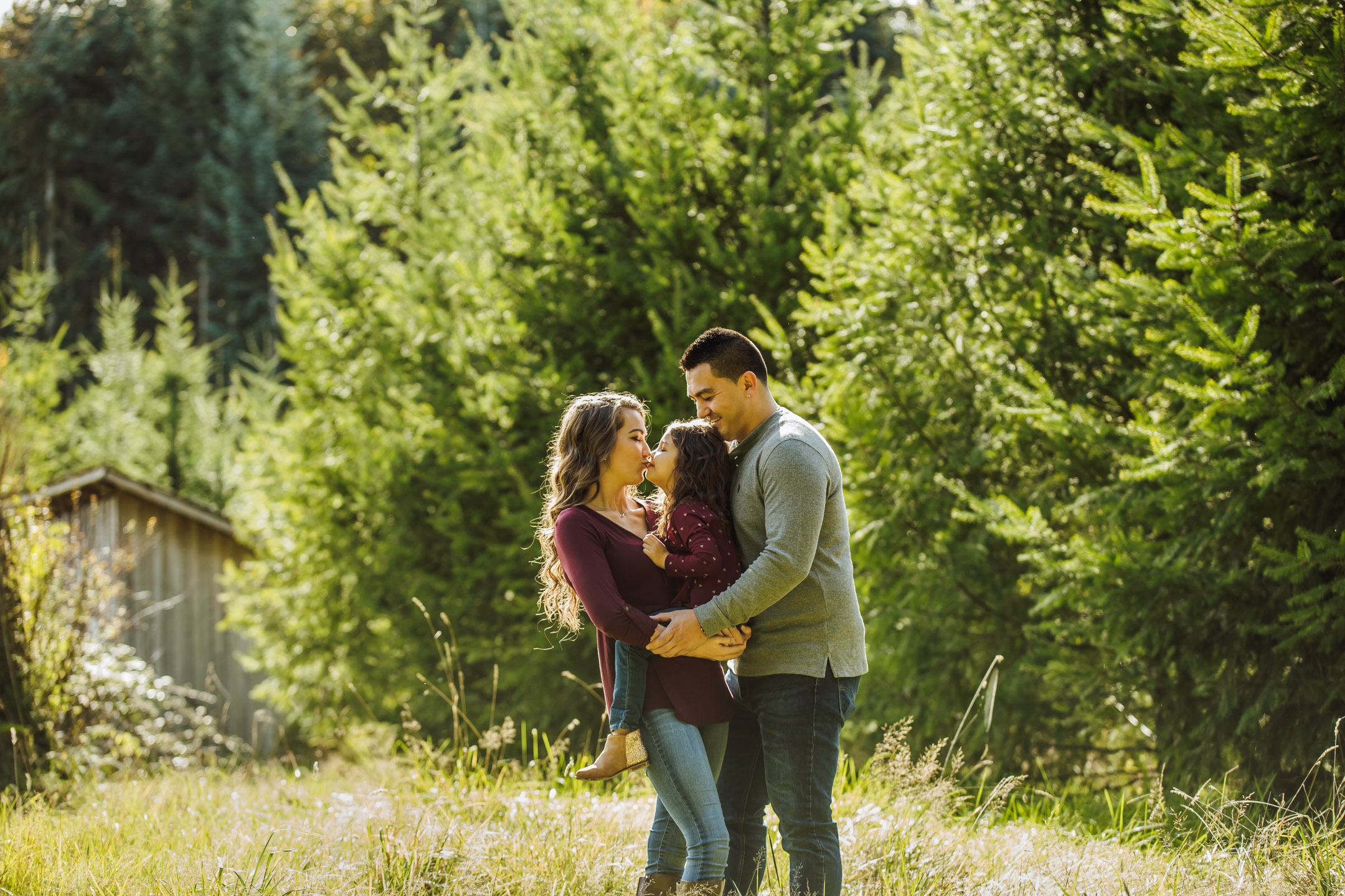 Family of three photography session at Snoqualmie Falls by James Thomas Long Photography