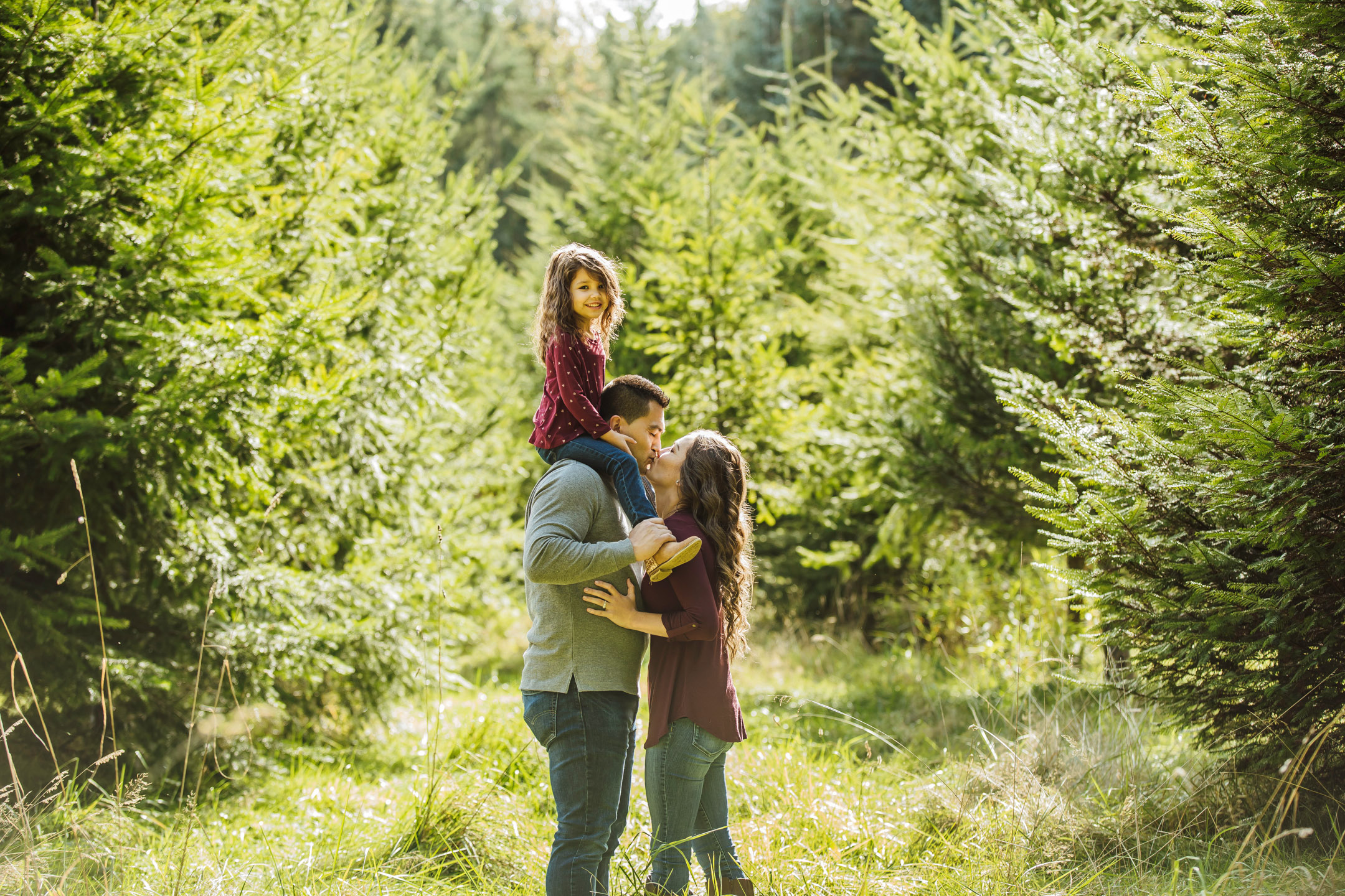 Family of three photography session at Snoqualmie Falls by James Thomas Long Photography