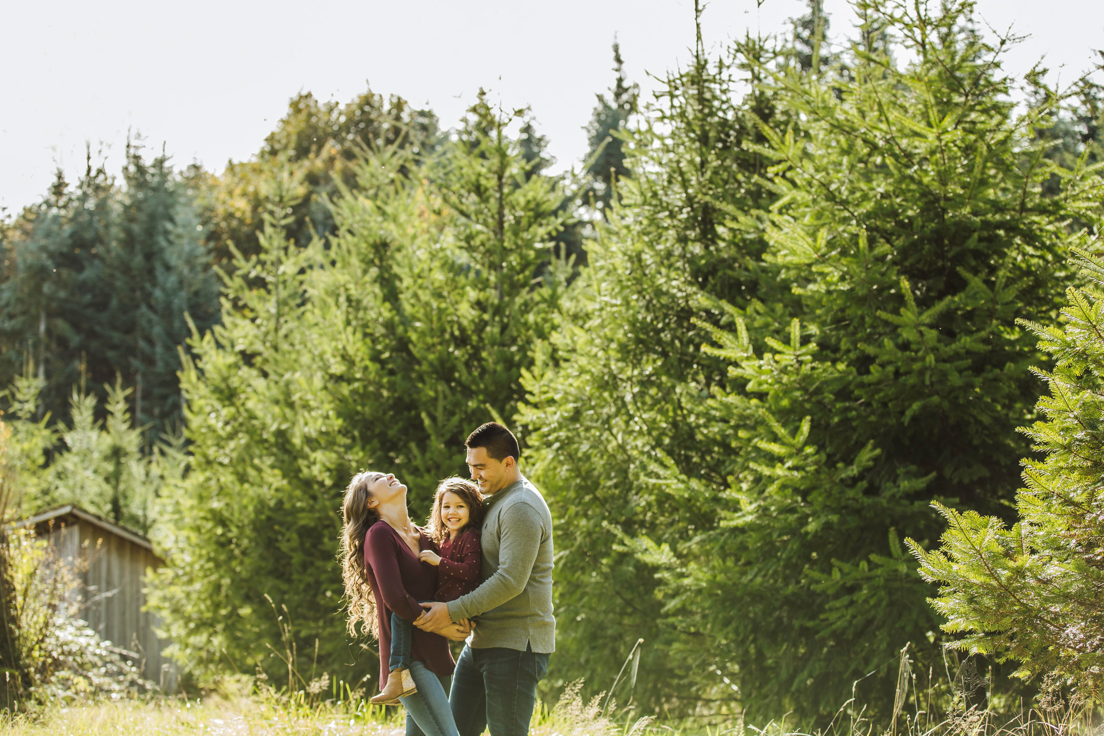 Family of three photography session at Snoqualmie Falls by James Thomas Long Photography