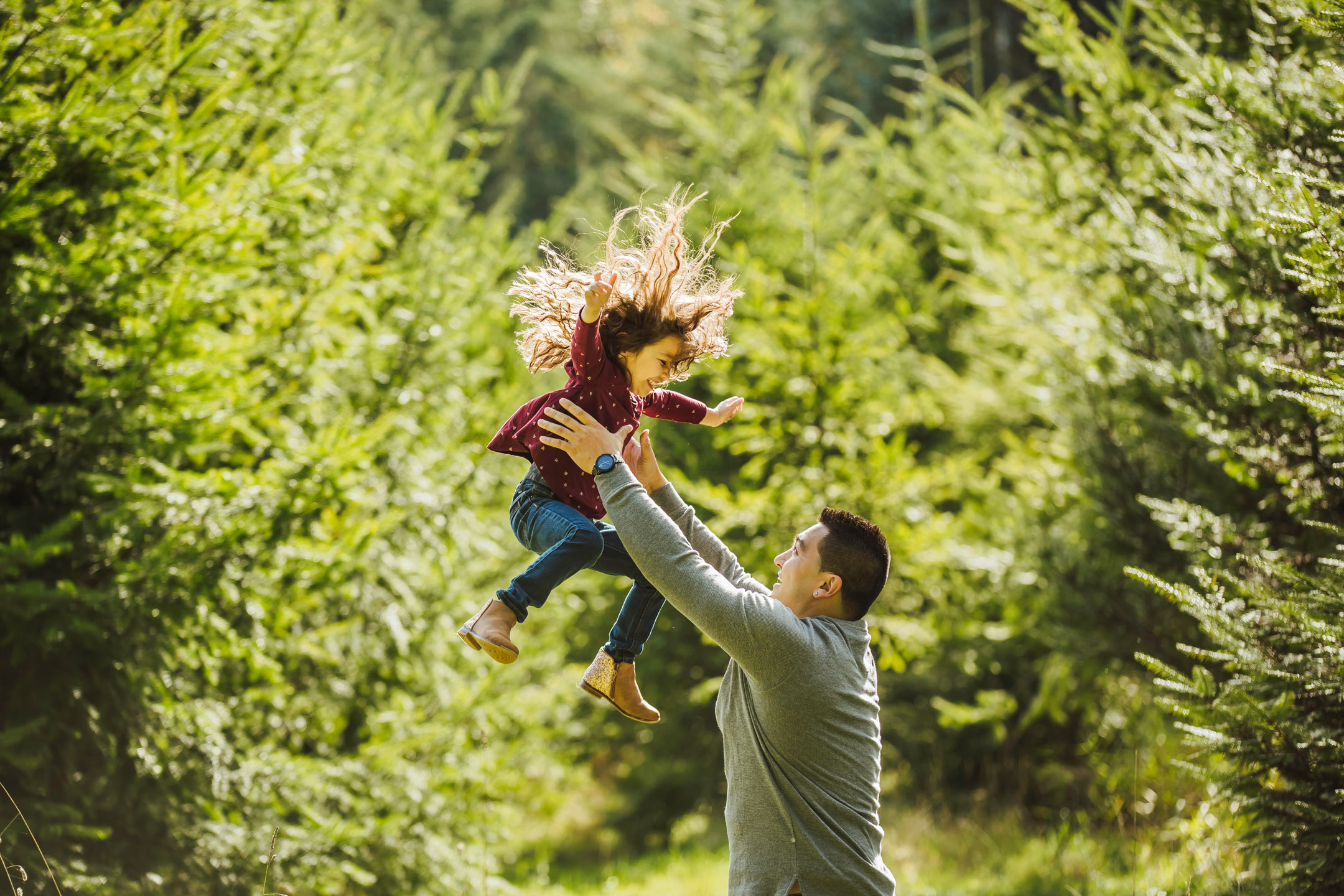 Family of three photography session at Snoqualmie Falls by James Thomas Long Photography