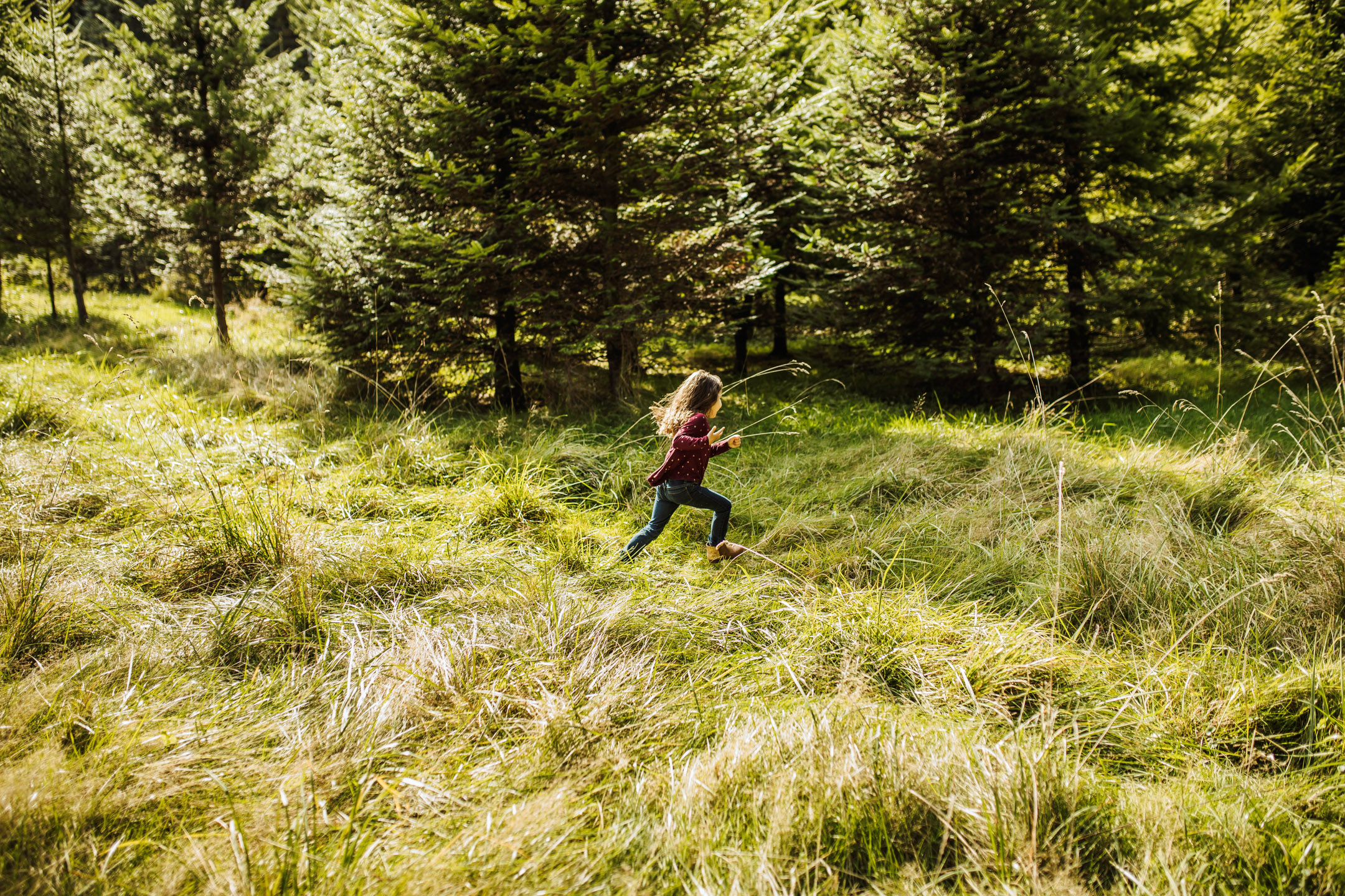 Family of three photography session at Snoqualmie Falls by James Thomas Long Photography