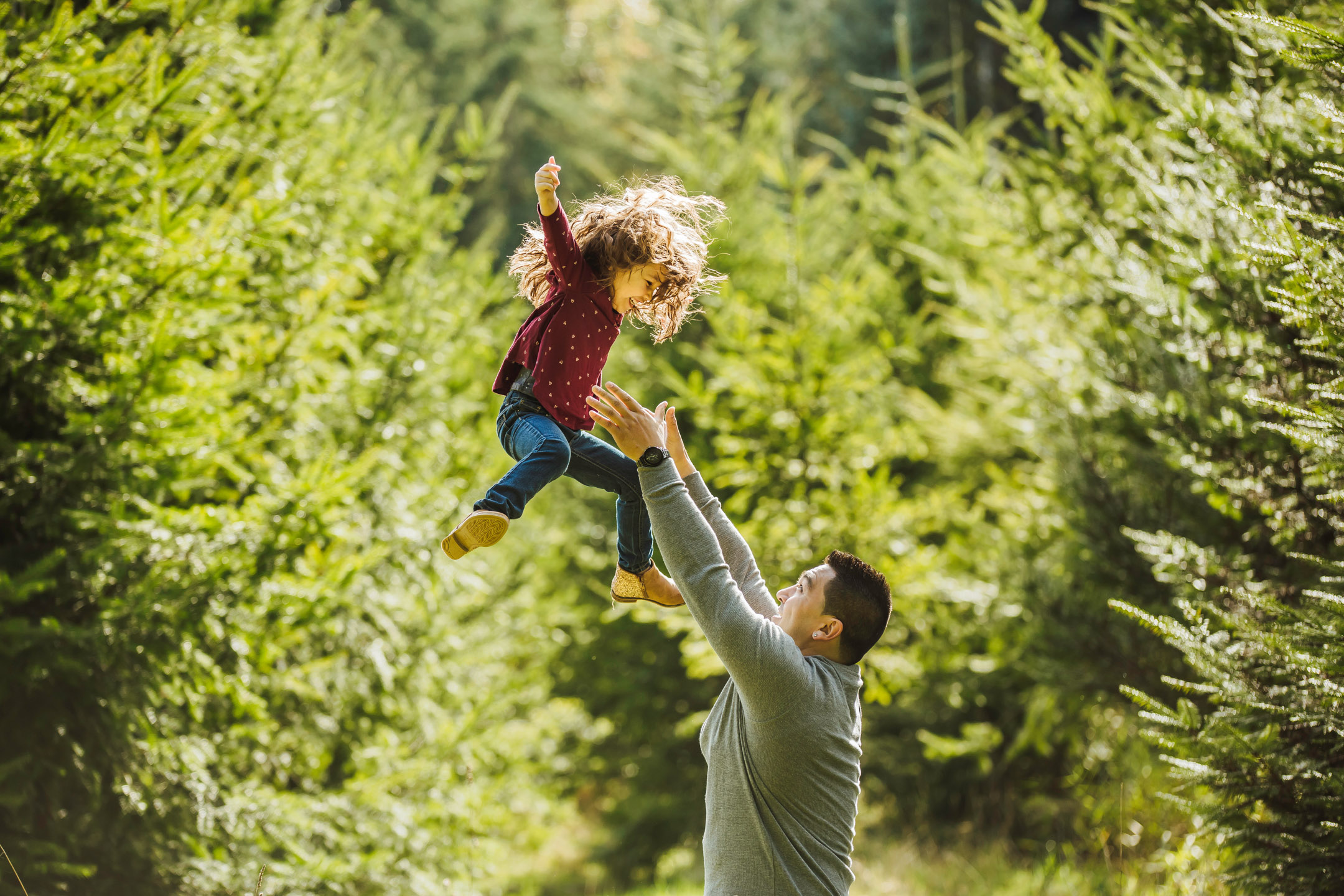 Family of three photography session at Snoqualmie Falls by James Thomas Long Photography