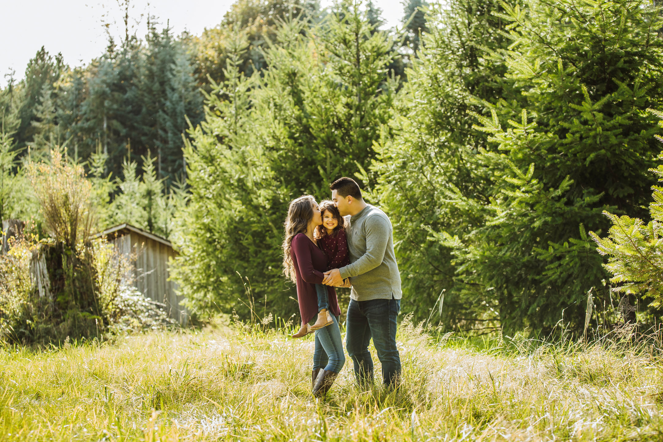 Family of three photography session at Snoqualmie Falls by James Thomas Long Photography