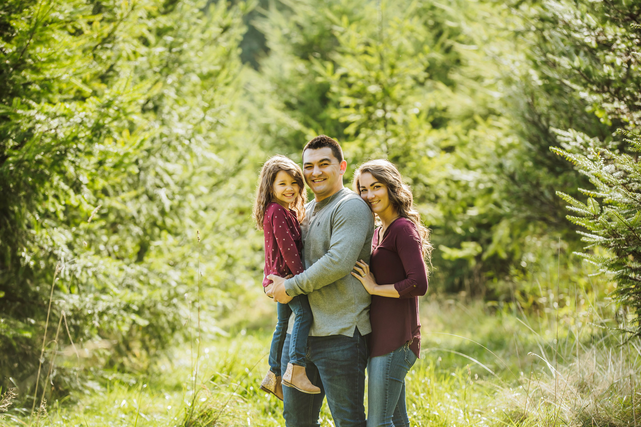 Family of three photography session at Snoqualmie Falls by James Thomas Long Photography