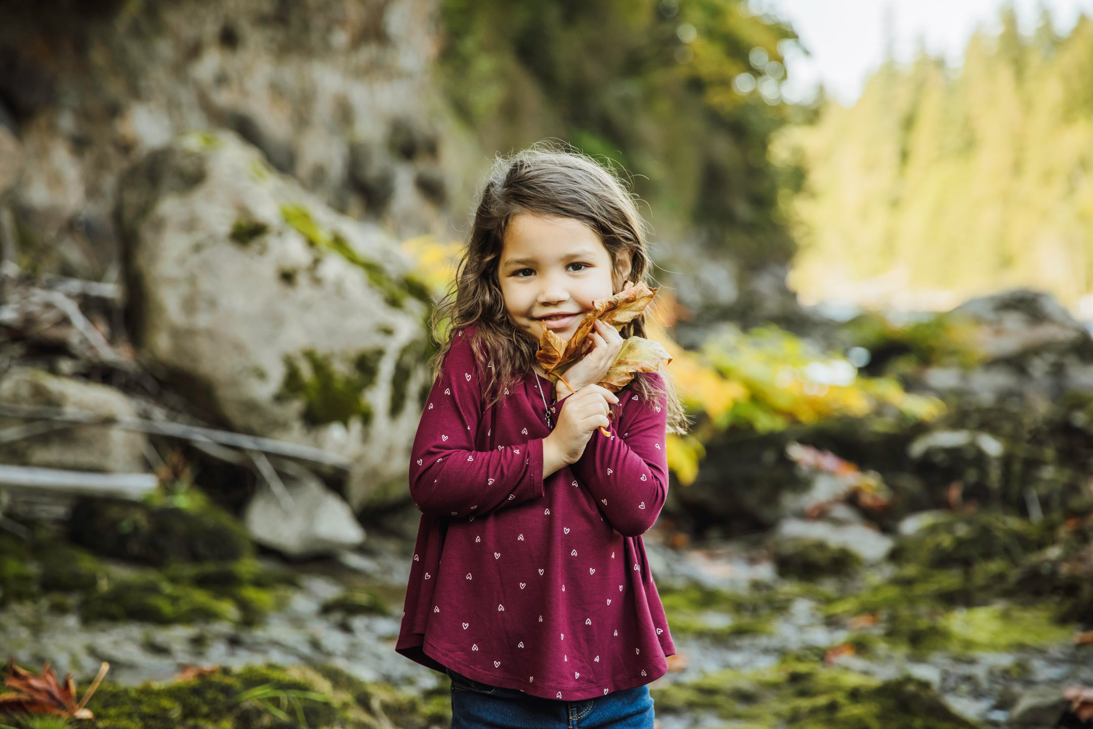 Family of three photography session at Snoqualmie Falls by James Thomas Long Photography