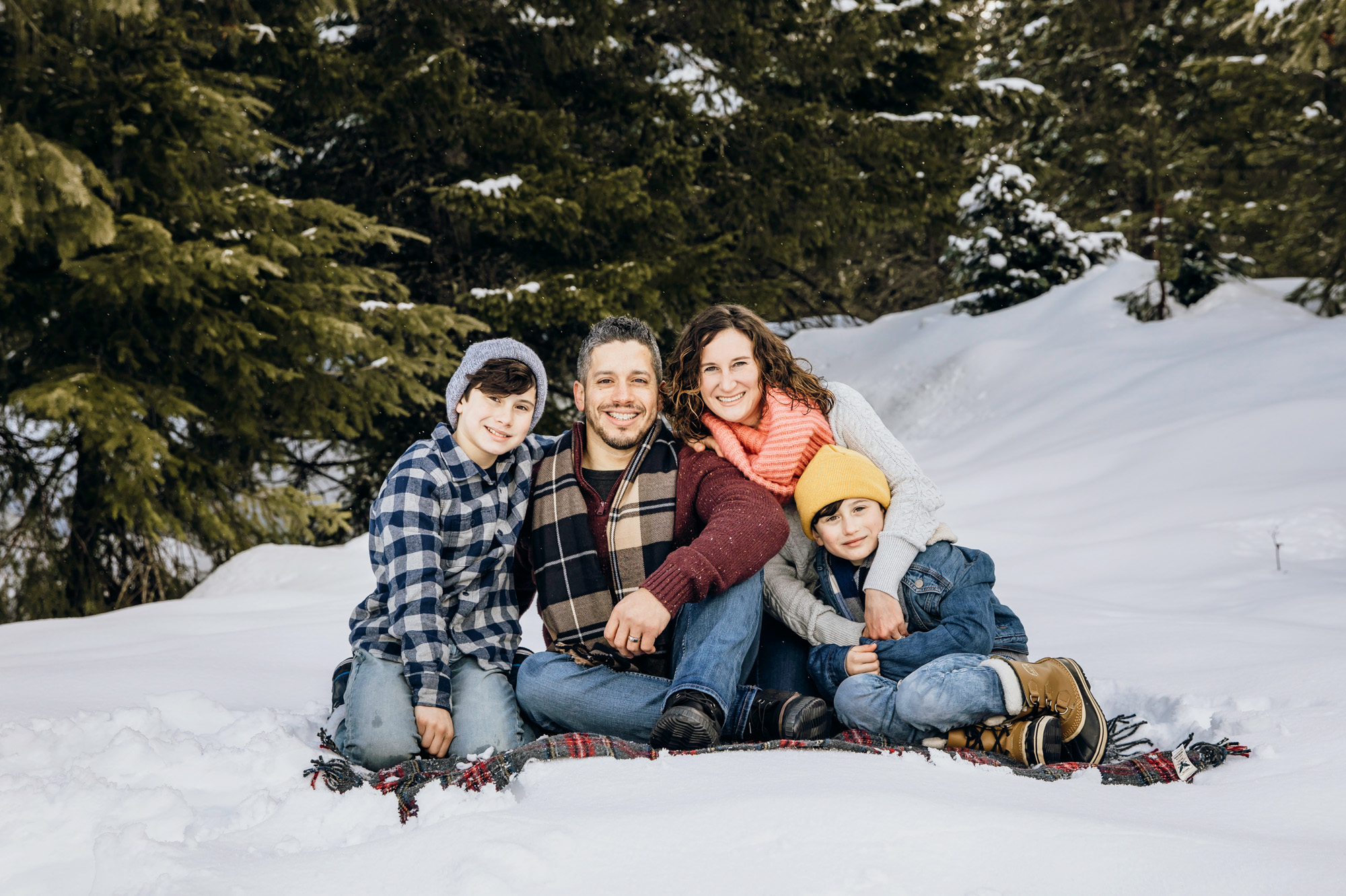 Snoqualmie Pass family of four session in the snow by Seattle family photographer James Thomas Long Photography