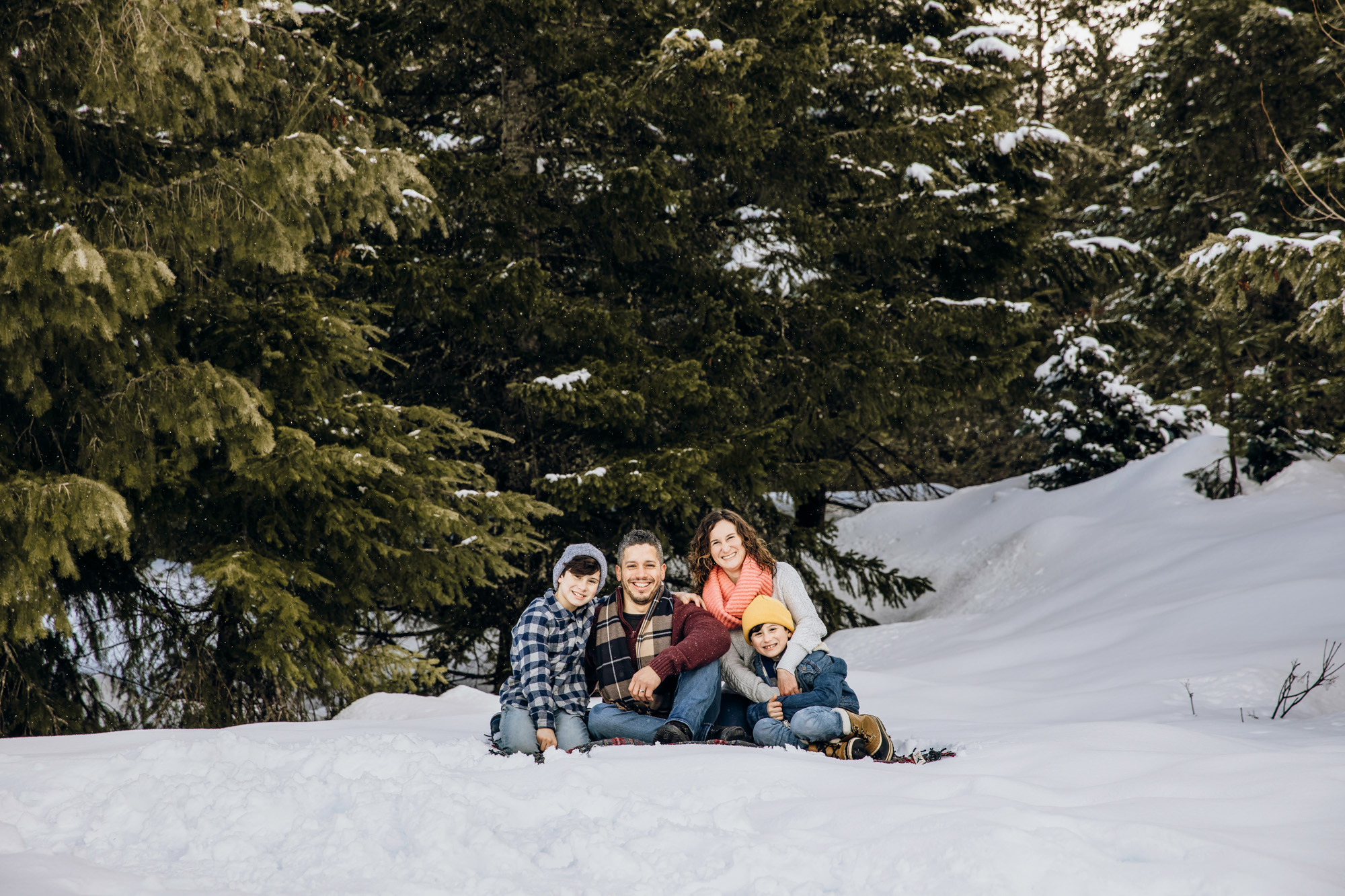 Snoqualmie Pass family of four session in the snow by Seattle family photographer James Thomas Long Photography