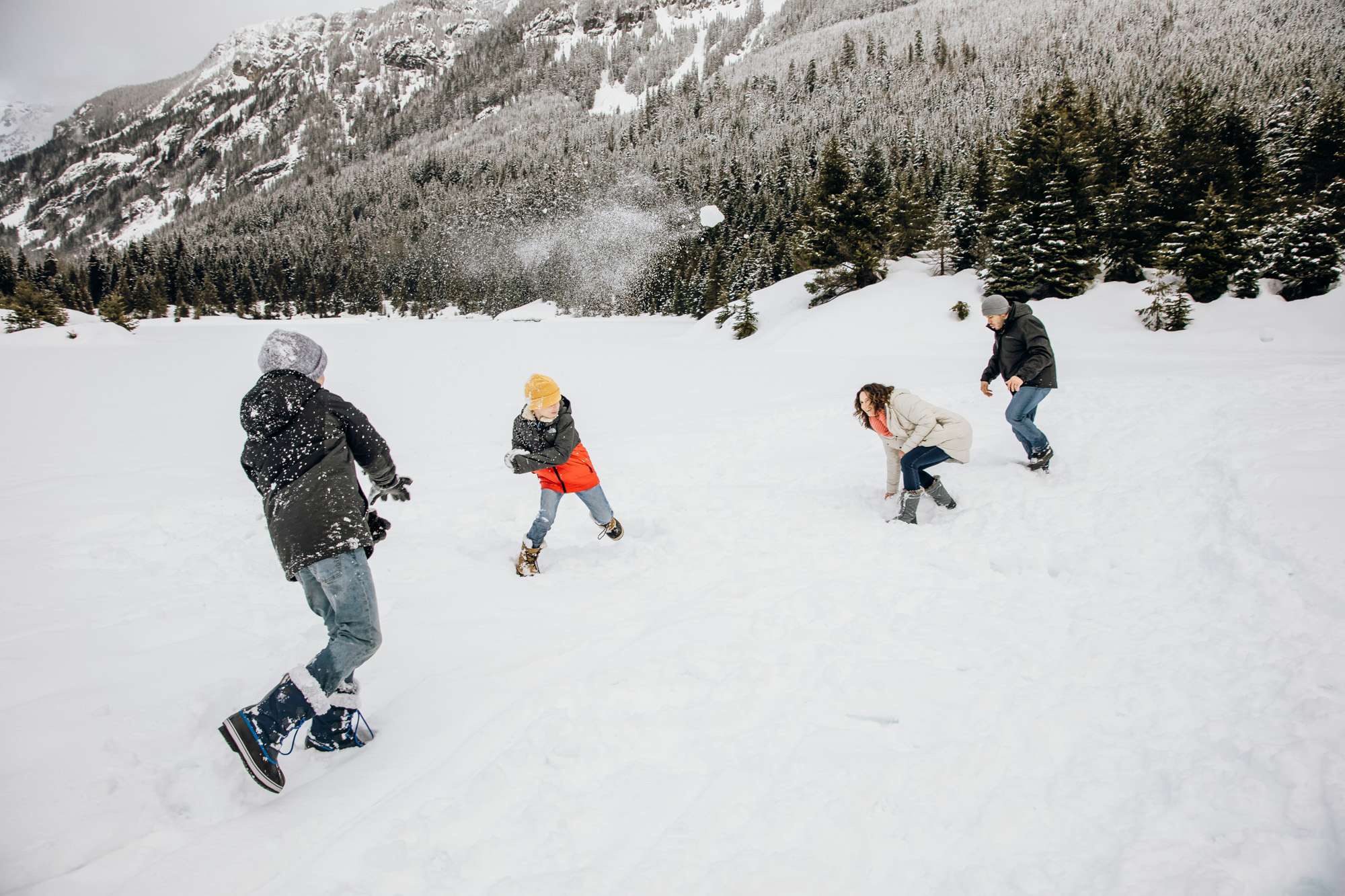 Snoqualmie Pass family of four session in the snow by Seattle family photographer James Thomas Long Photography