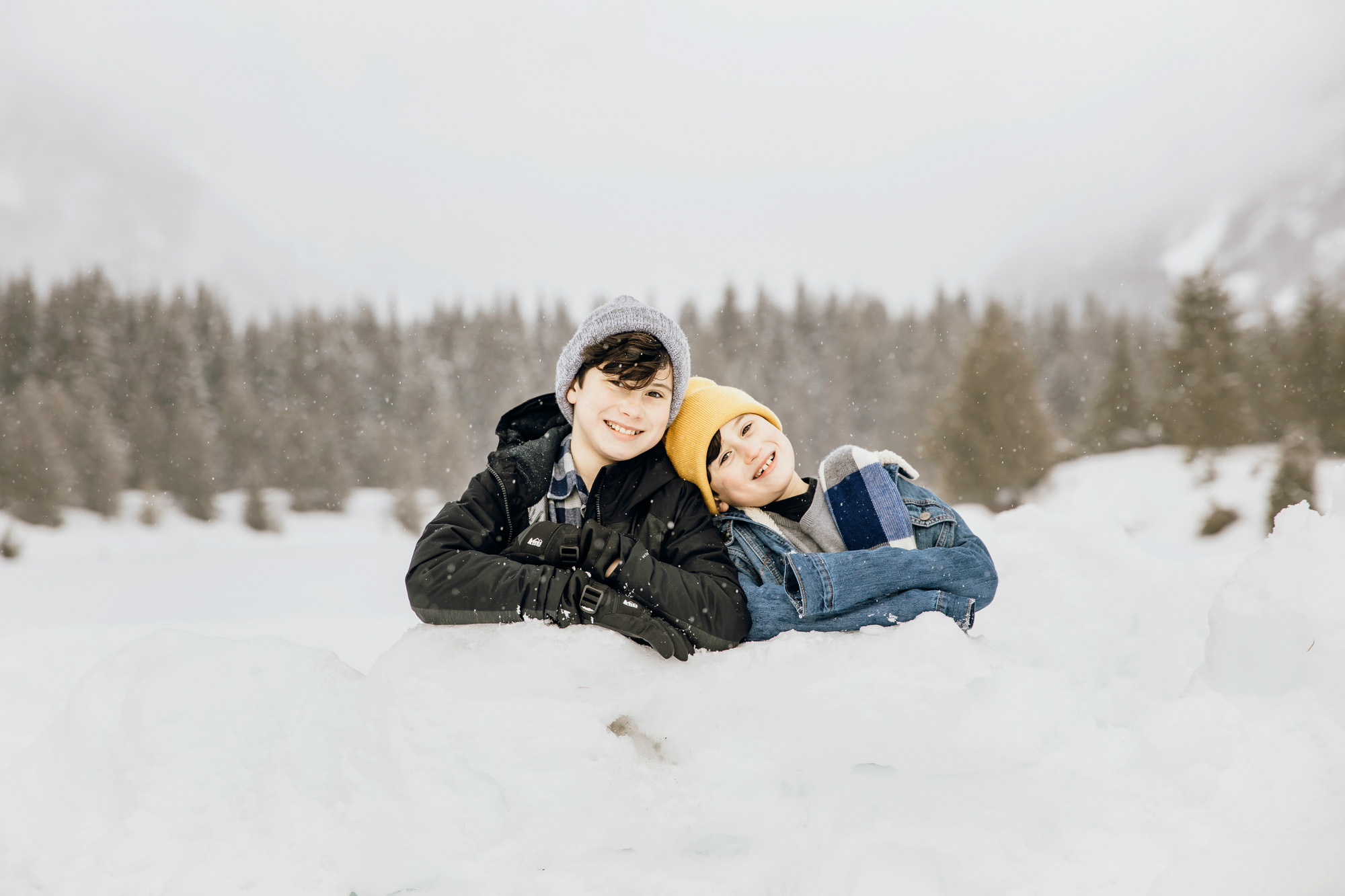 Snoqualmie Pass family of four session in the snow by Seattle family photographer James Thomas Long Photography