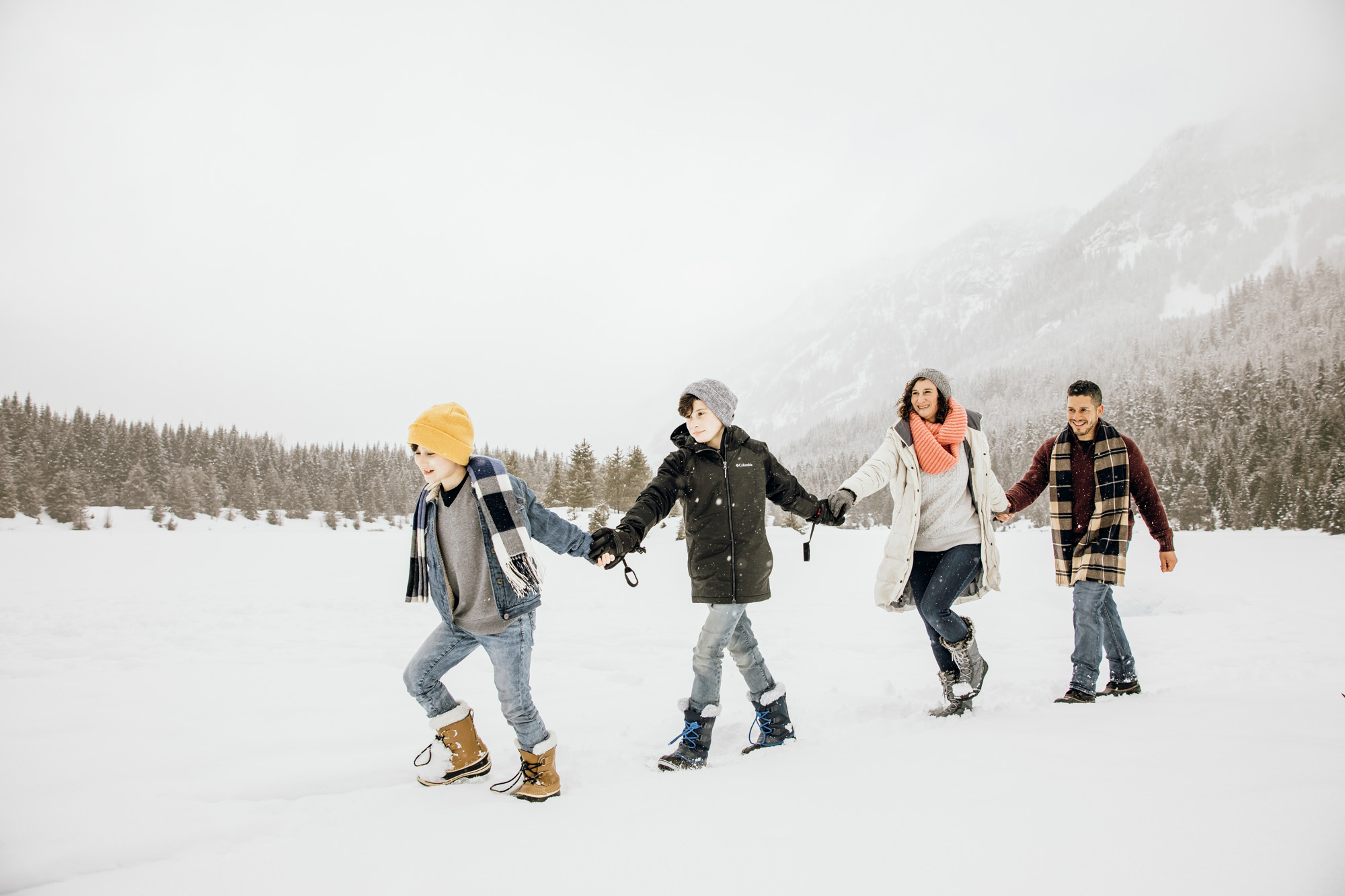 Snoqualmie Pass family of four session in the snow by Seattle family photographer James Thomas Long Photography