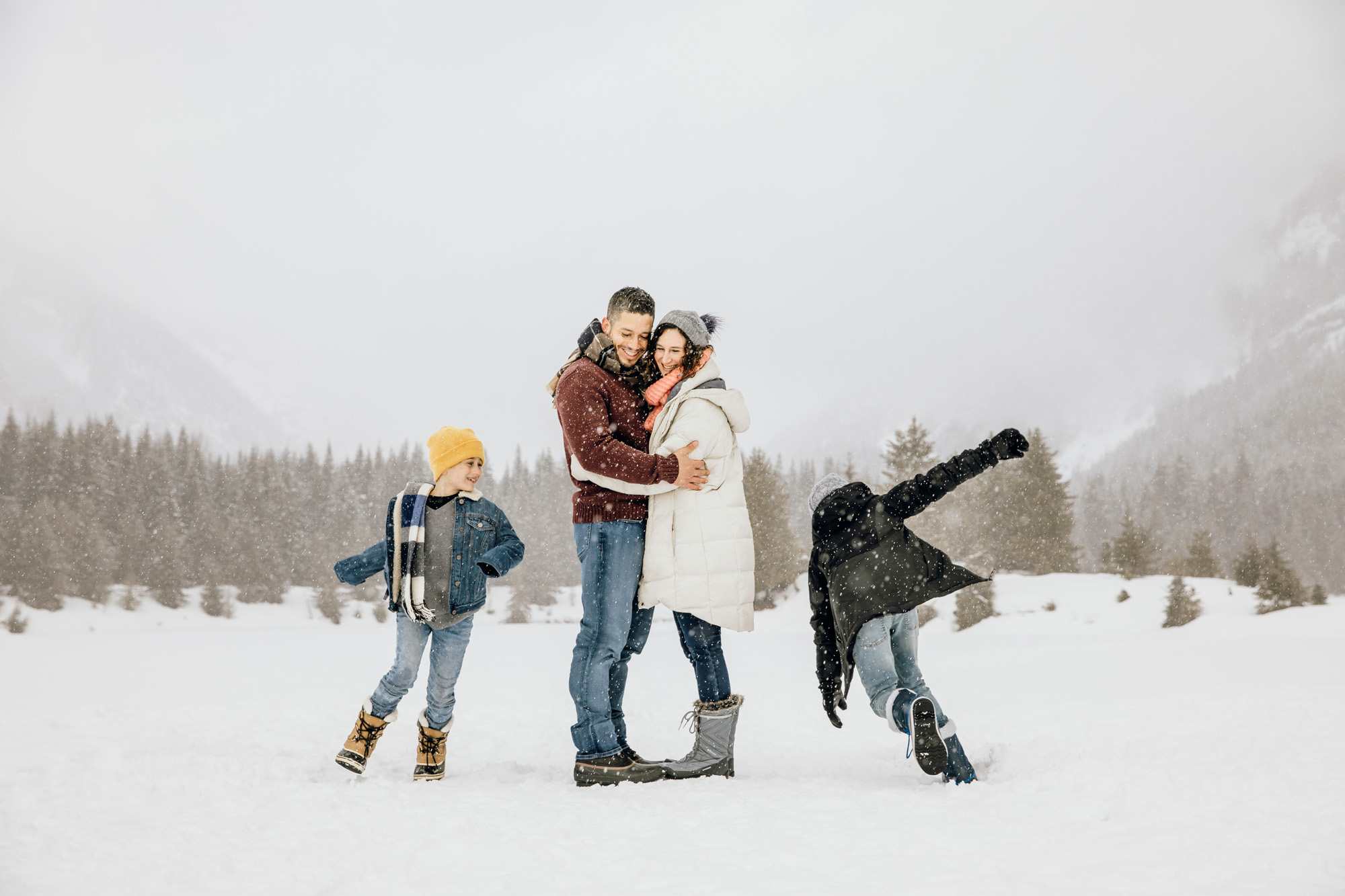 Snoqualmie Pass family of four session in the snow by Seattle family photographer James Thomas Long Photography