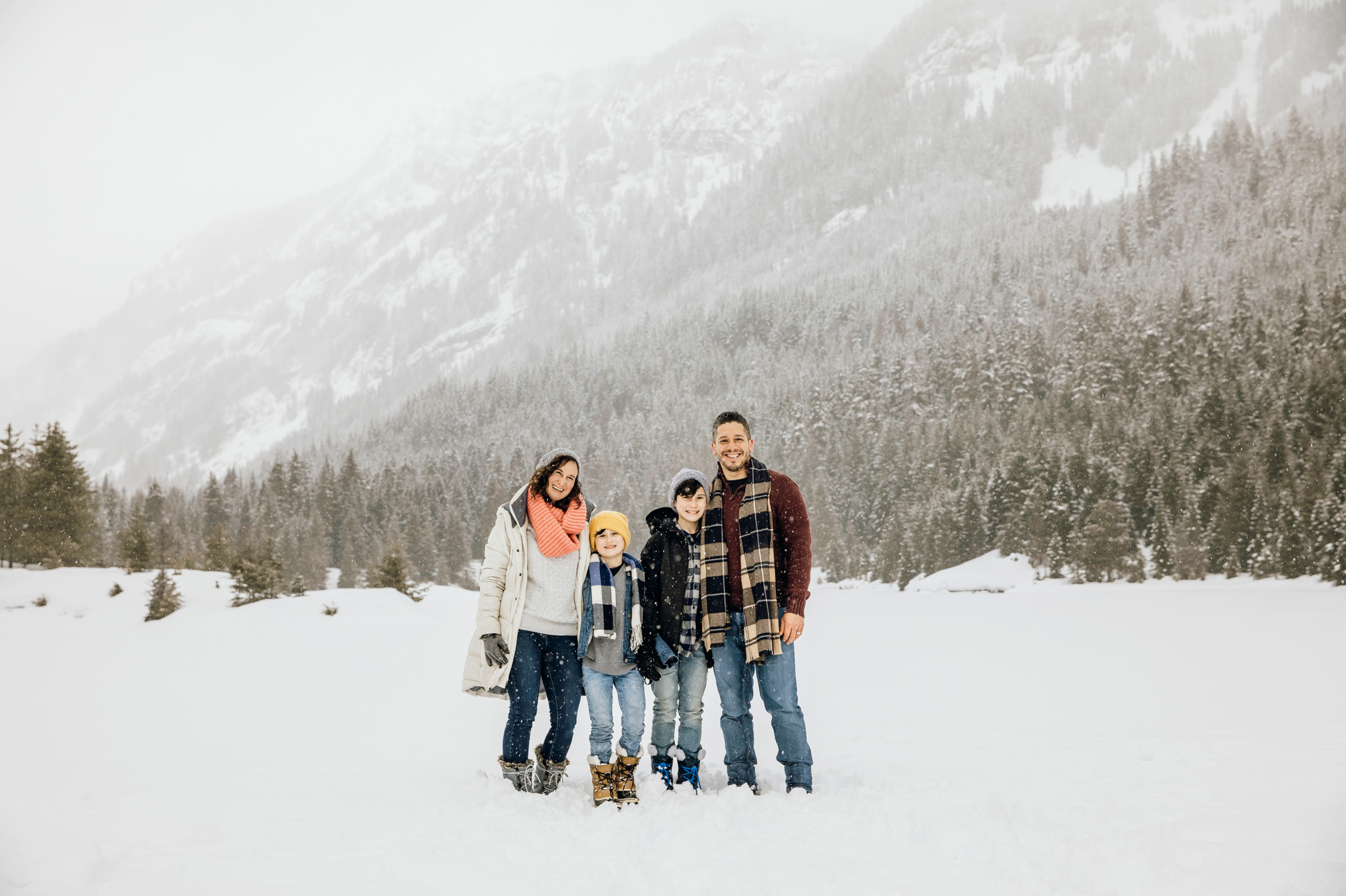 Snoqualmie Pass family of four session in the snow by Seattle family photographer James Thomas Long Photography