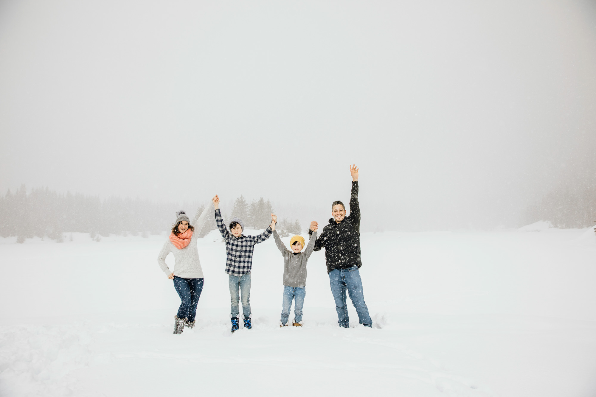 Snoqualmie Pass family of four session in the snow by Seattle family photographer James Thomas Long Photography