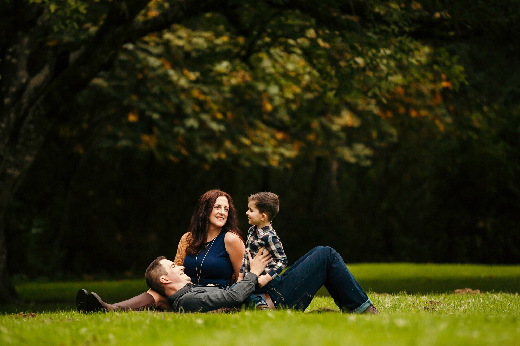 Family of Three in Carnation by Snoqualmie Family Photographer James Thomas Long Photography