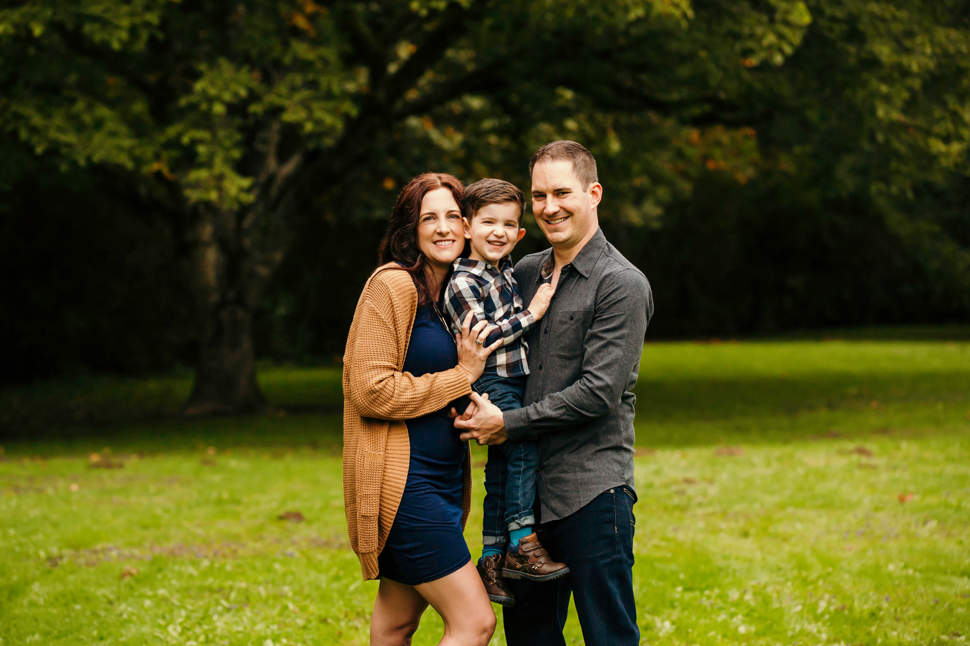 Family of Three in Carnation by Snoqualmie Family Photographer James Thomas Long Photography