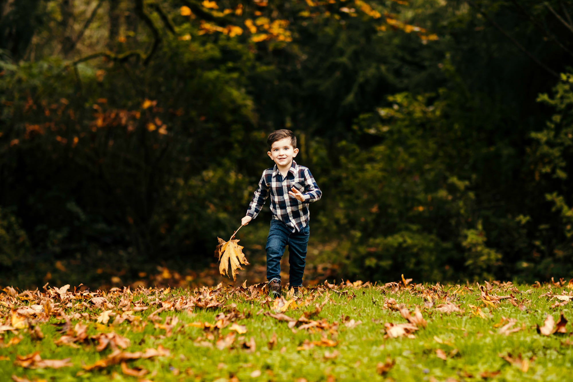 Family of Three in Carnation by Snoqualmie Family Photographer James Thomas Long Photography