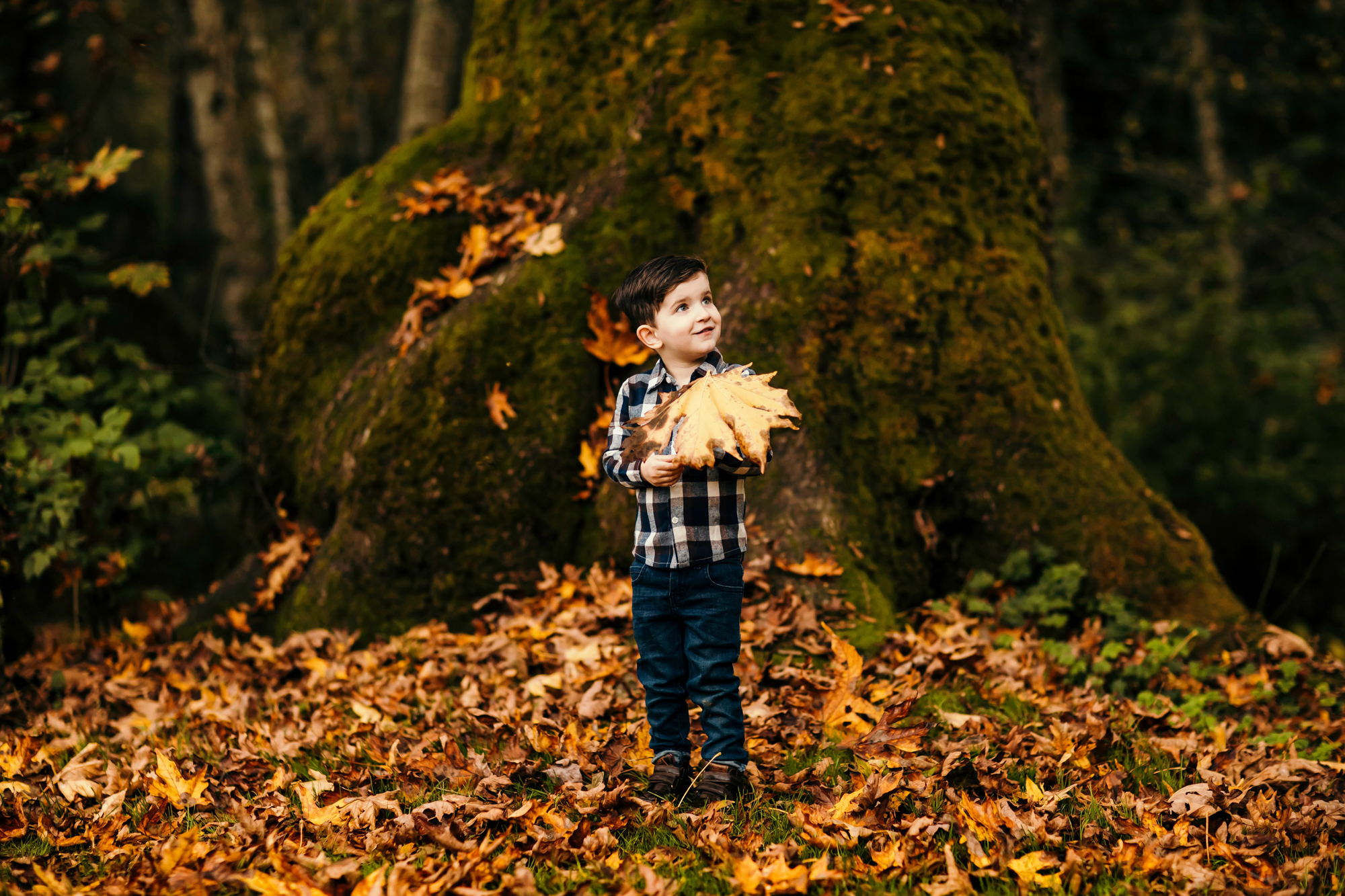 Family of Three in Carnation by Snoqualmie Family Photographer James Thomas Long Photography