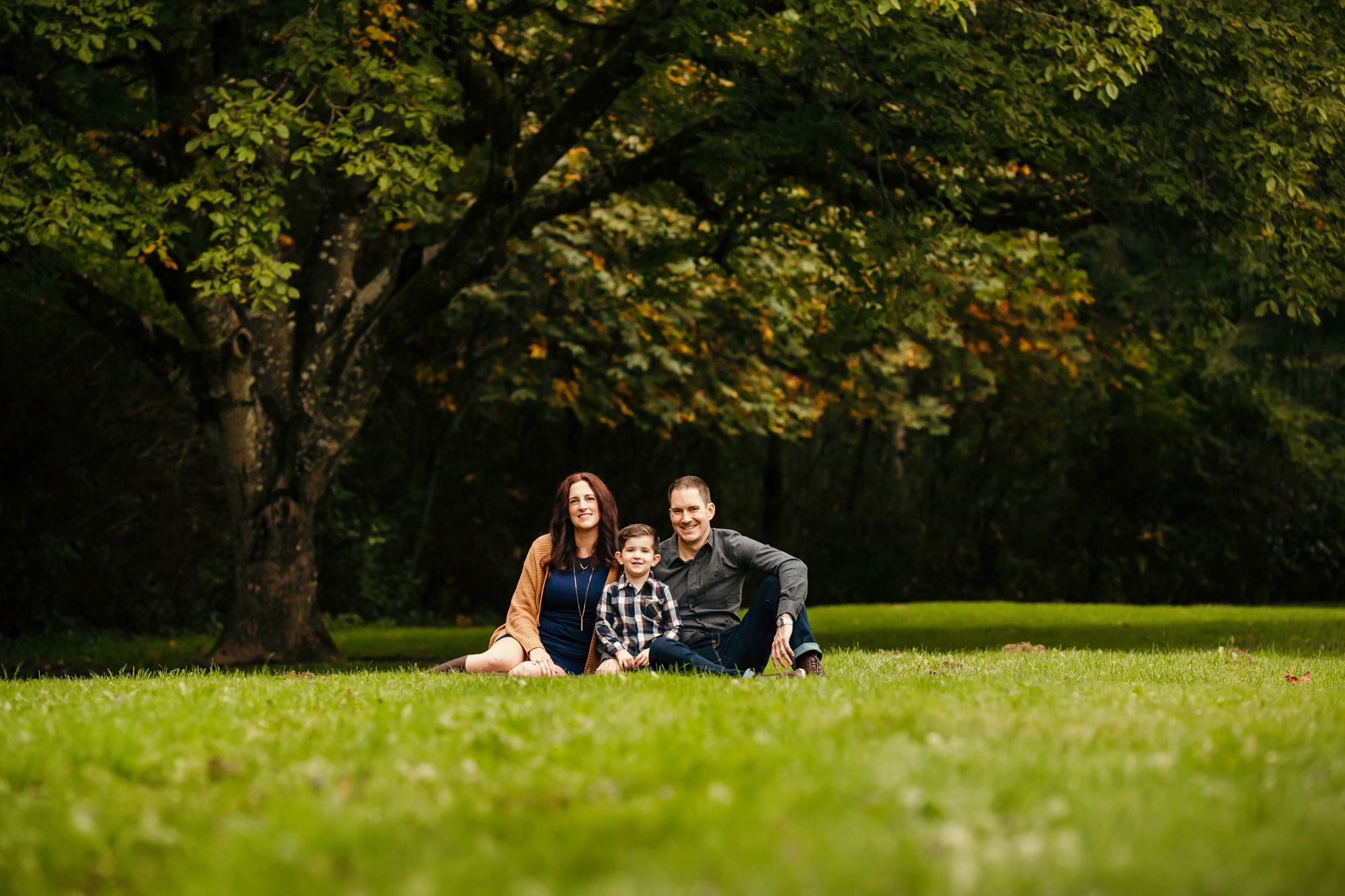 Family of Three in Carnation by Snoqualmie Family Photographer James Thomas Long Photography