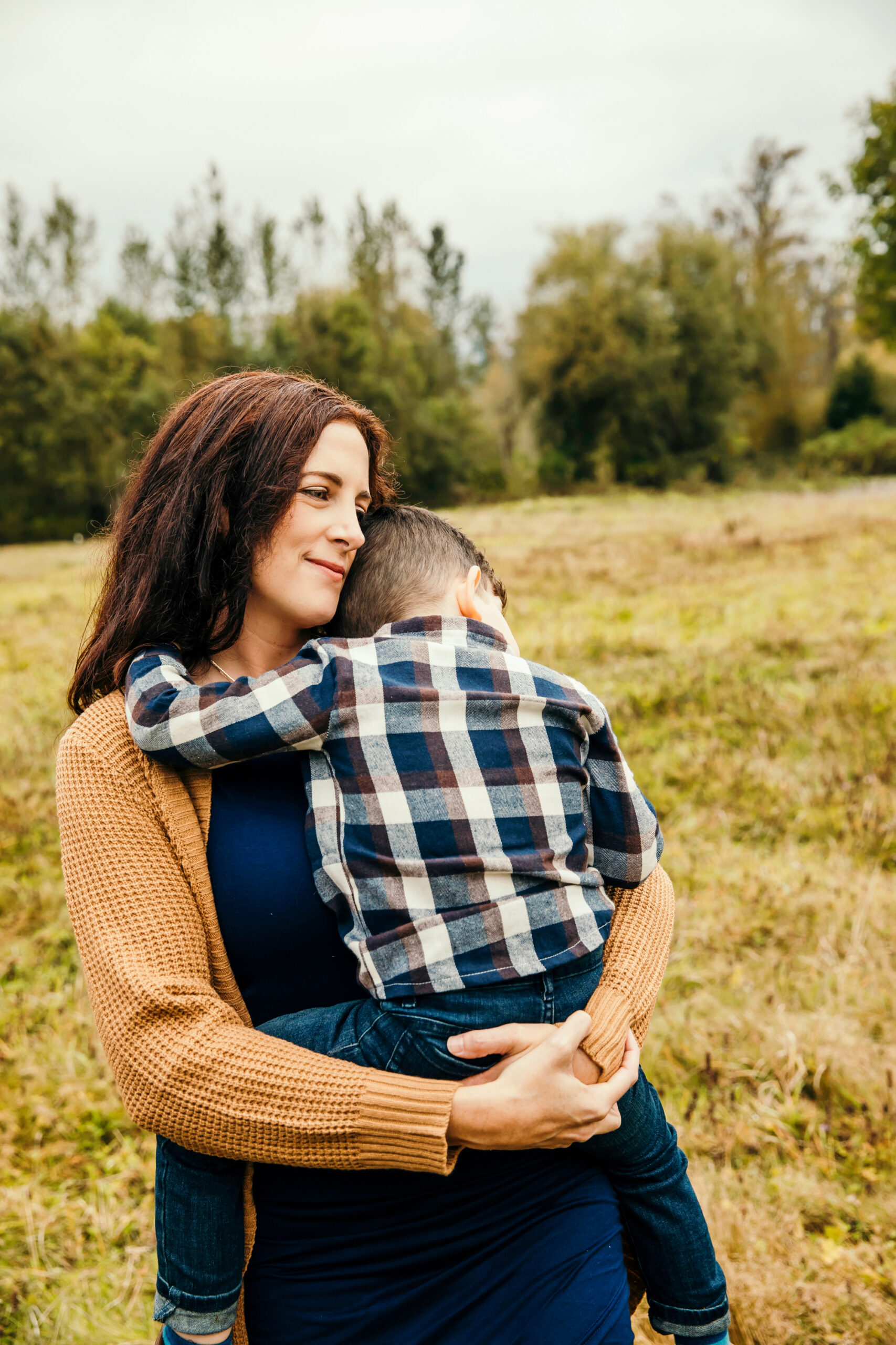 Family of Three in Carnation by Snoqualmie Family Photographer James Thomas Long Photography