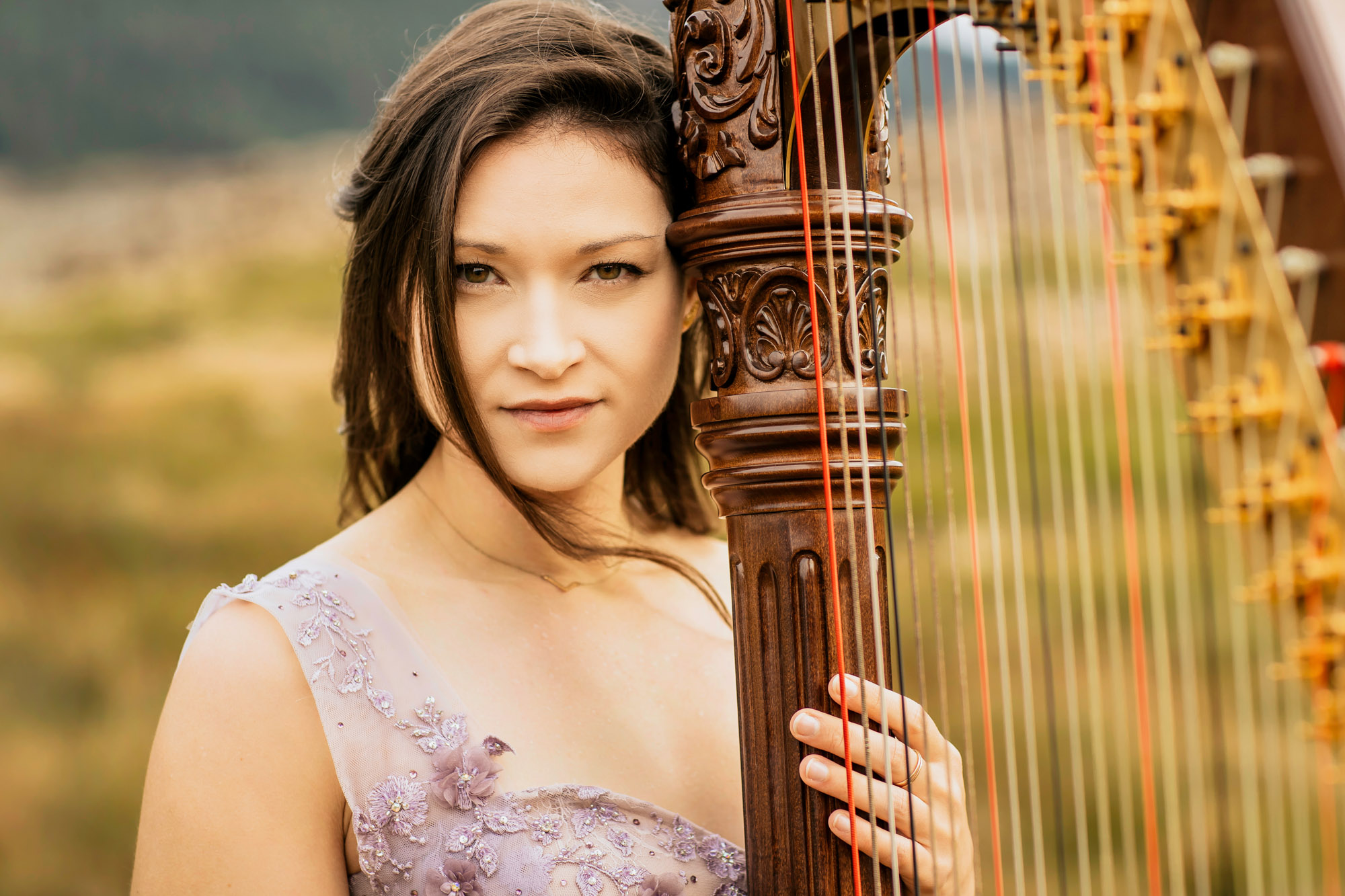 Portrait of a harpist in the Cascade Mountains by Seattle portrait photographer James Thomas Long Photography