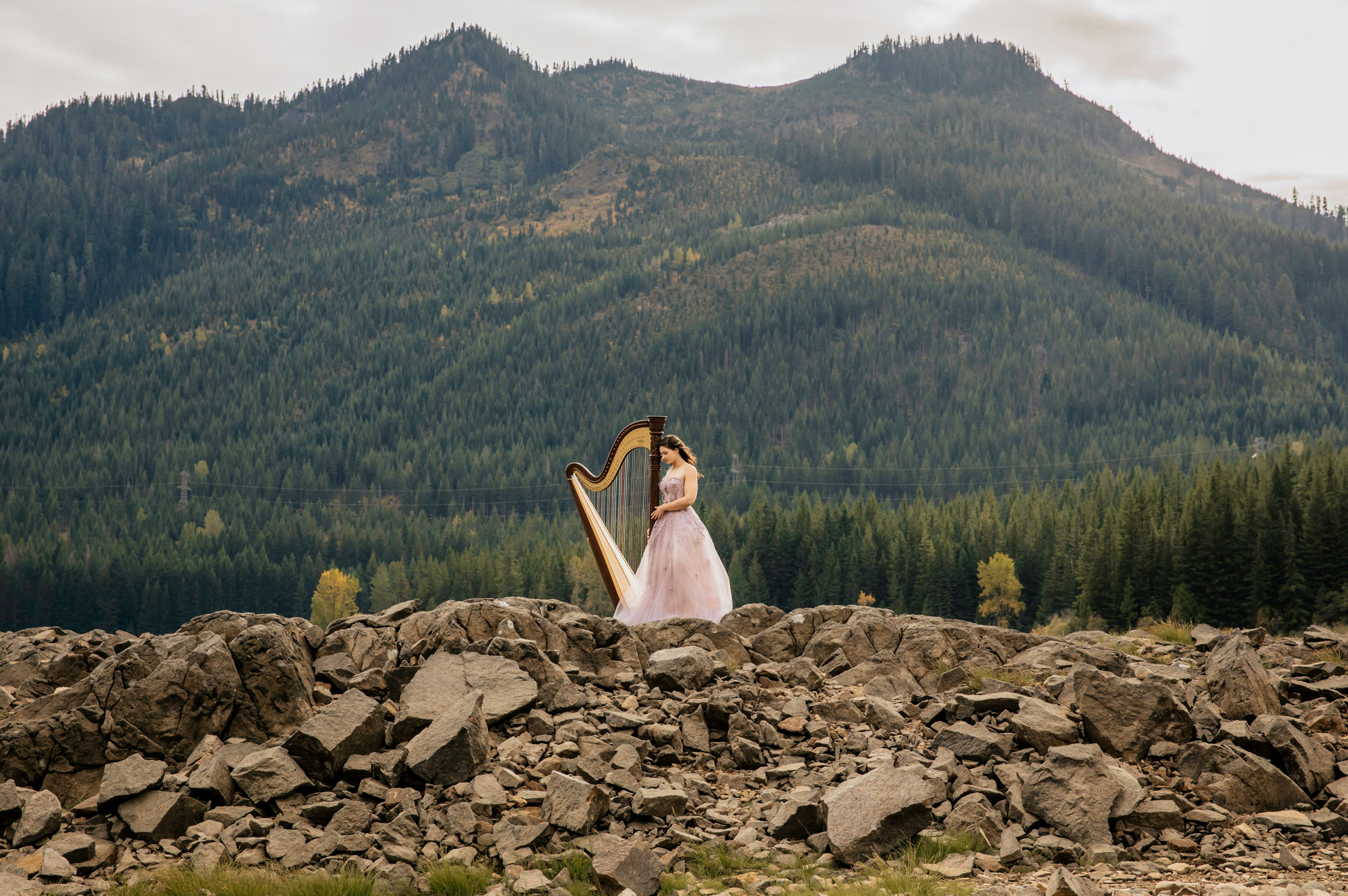 Portrait of a harpist in the Cascade Mountains by Seattle portrait photographer James Thomas Long Photography