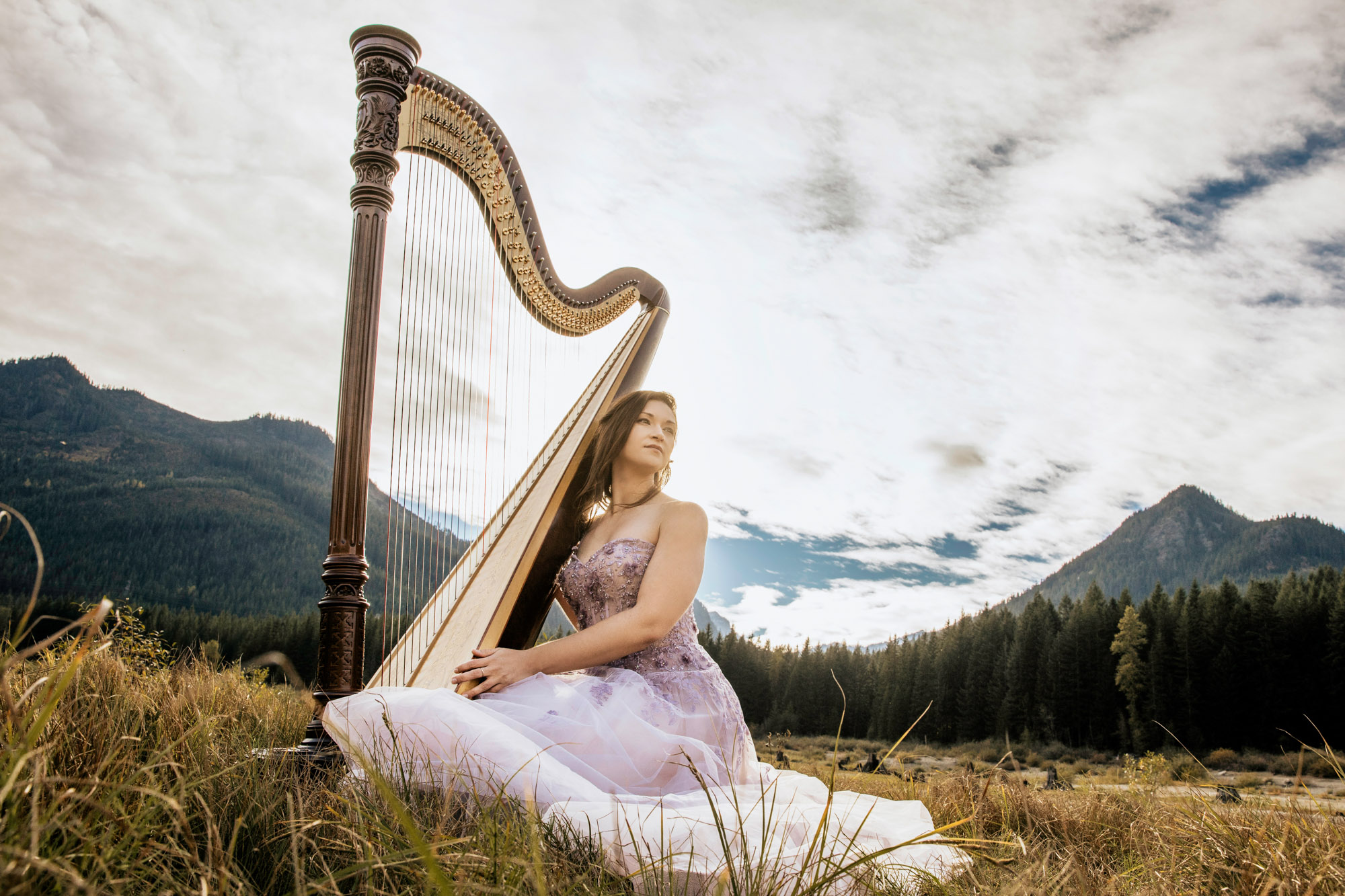 Portrait of a harpist in the Cascade Mountains by Seattle portrait photographer James Thomas Long Photography