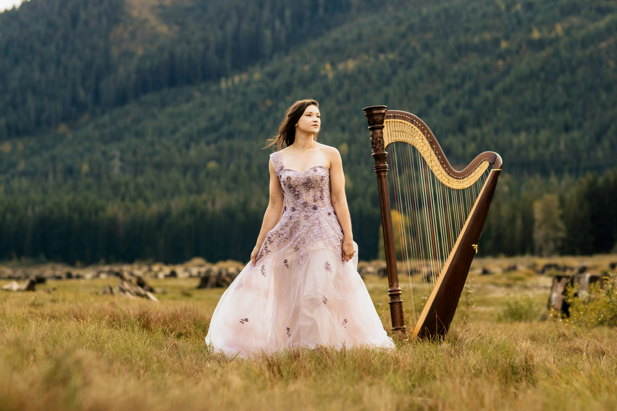 Portrait of a harpist in the Cascade Mountains by Seattle portrait photographer James Thomas Long Photography