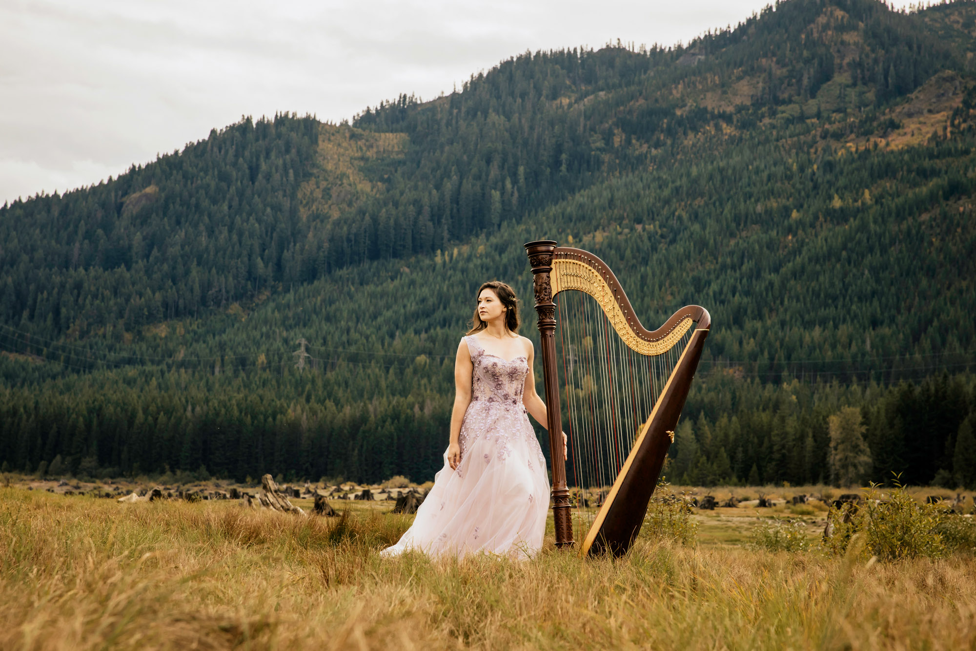 Portrait of a harpist in the Cascade Mountains by Seattle portrait photographer James Thomas Long Photography