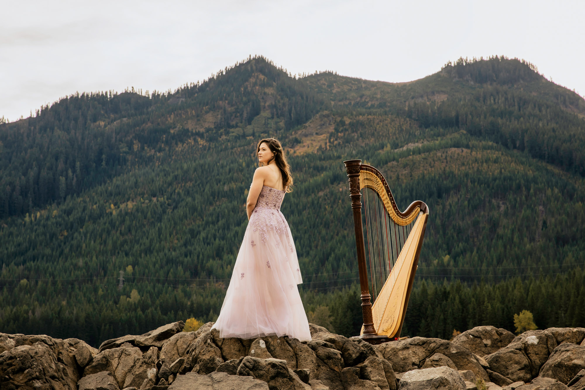 Portrait of a harpist in the Cascade Mountains by Seattle portrait photographer James Thomas Long Photography