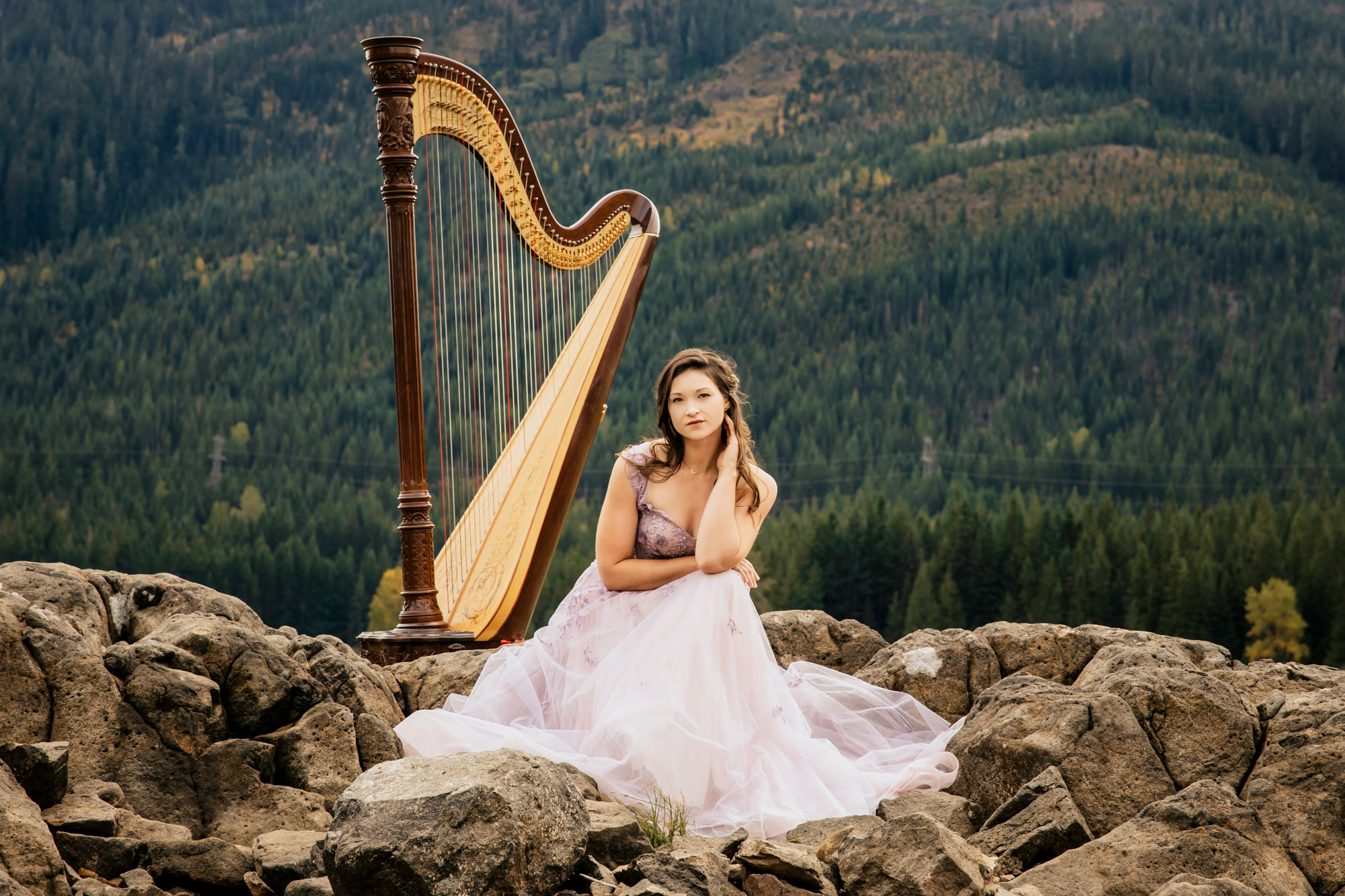 Portrait of a harpist in the Cascade Mountains by Seattle portrait photographer James Thomas Long Photography