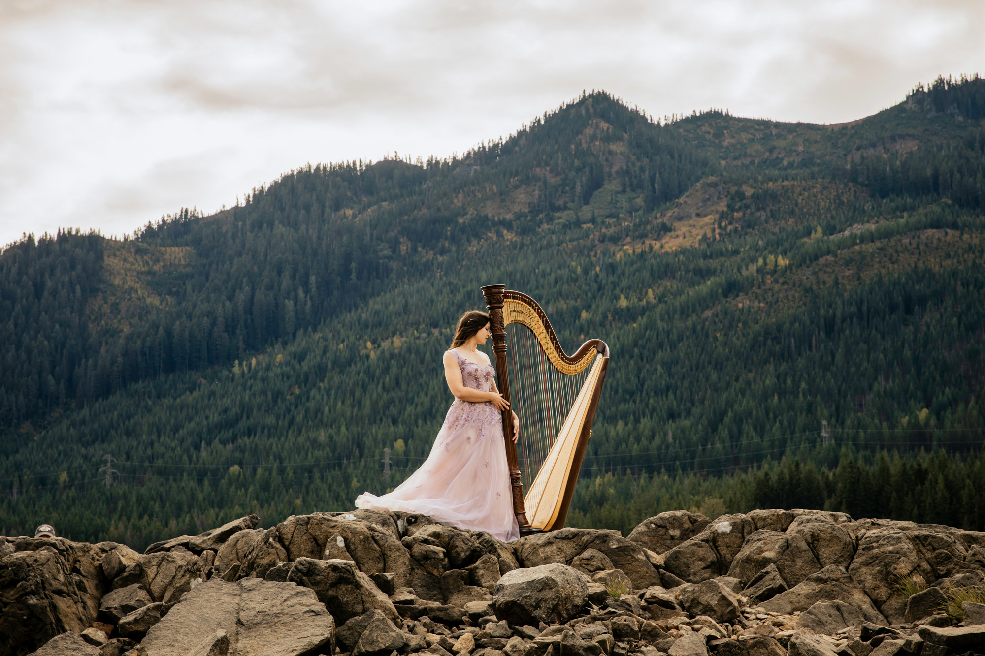 Portrait of a harpist in the Cascade Mountains by Seattle portrait photographer James Thomas Long Photography