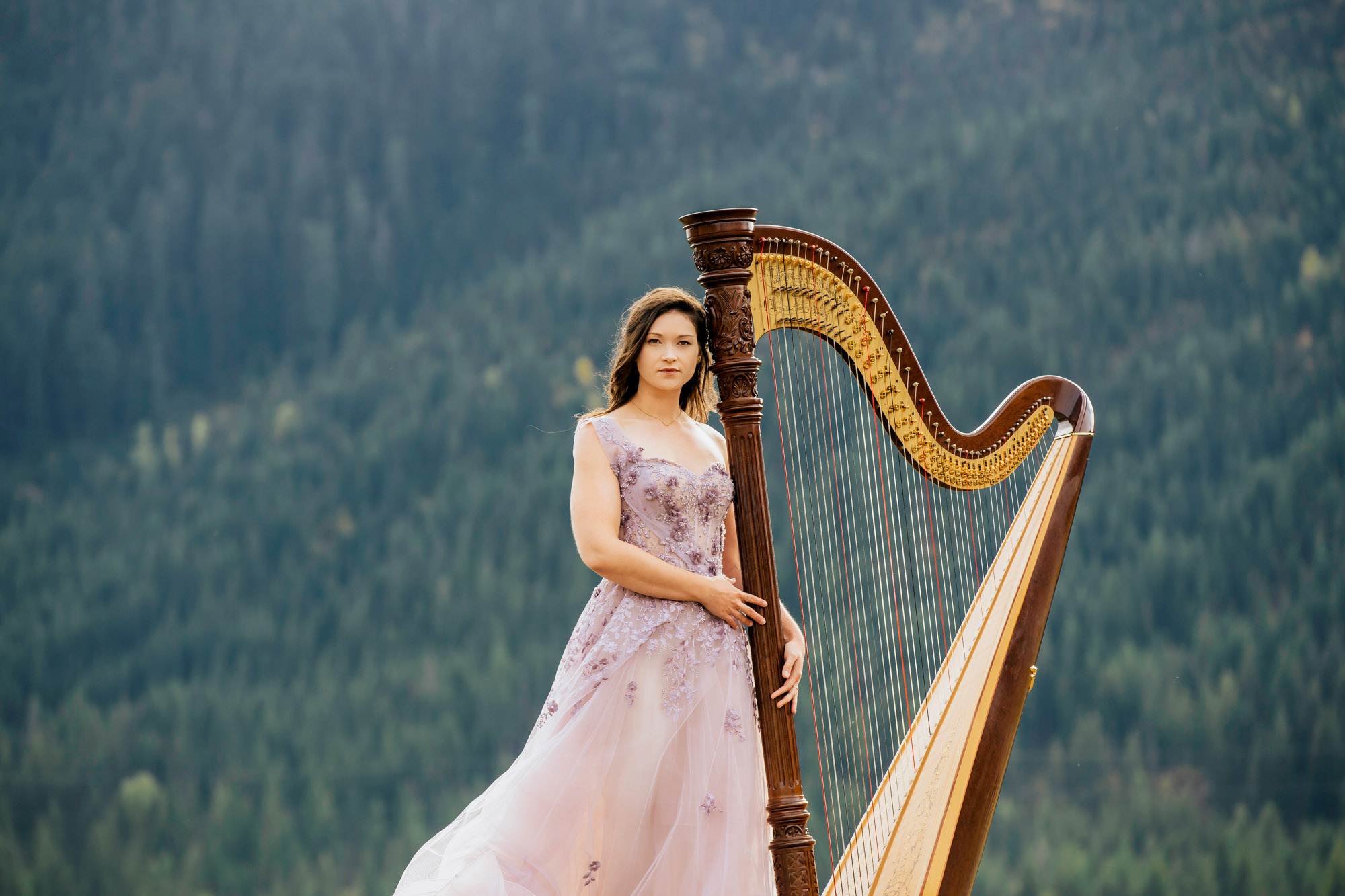 Portrait of a harpist in the Cascade Mountains by Seattle portrait photographer James Thomas Long Photography