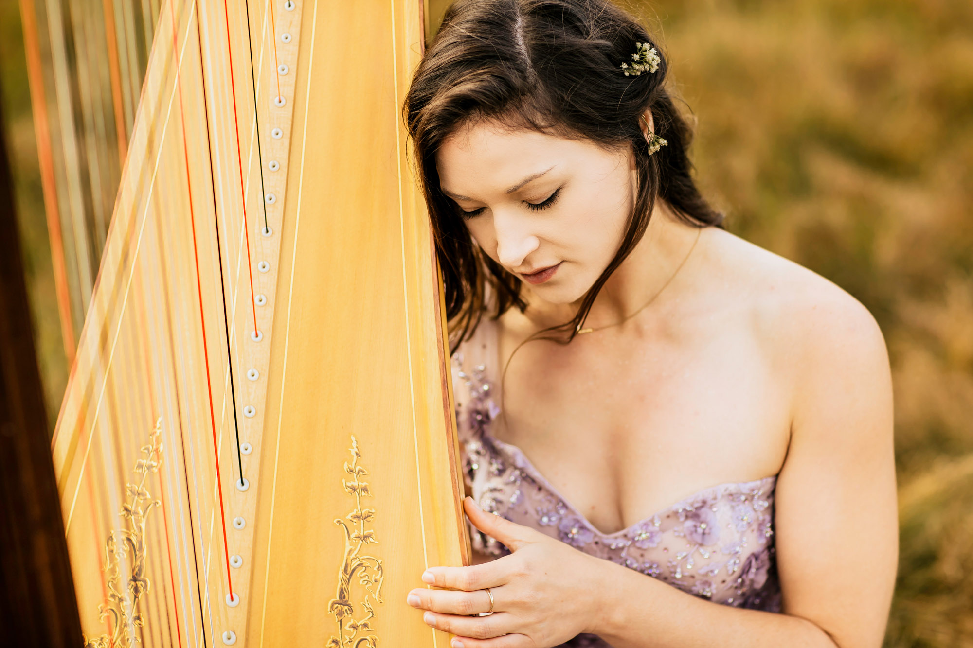 Portrait of a harpist in the Cascade Mountains by Seattle portrait photographer James Thomas Long Photography