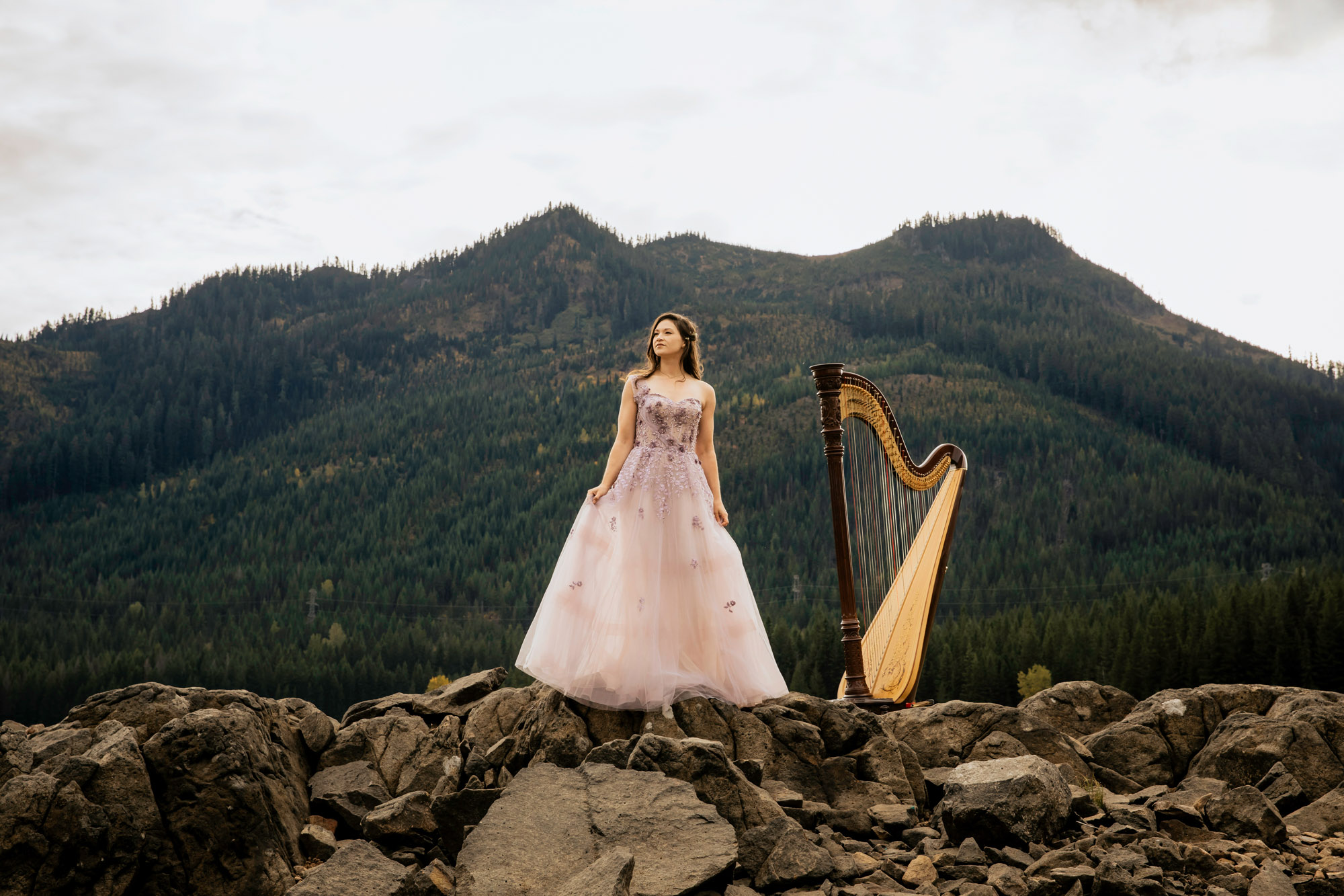 Portrait of a harpist in the Cascade Mountains by Seattle portrait photographer James Thomas Long Photography