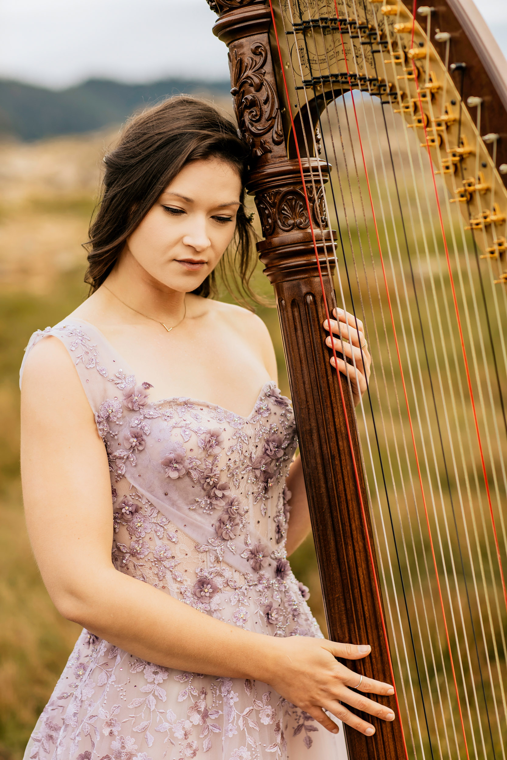 Portrait of a harpist in the Cascade Mountains by Seattle portrait photographer James Thomas Long Photography