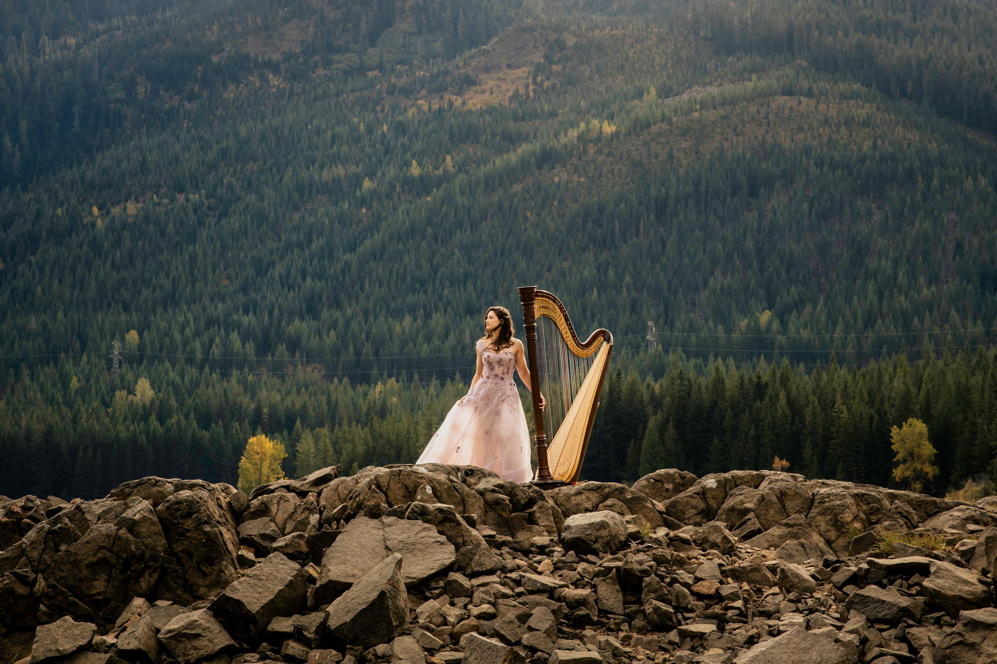 Portrait of a harpist in the Cascade Mountains by Seattle portrait photographer James Thomas Long Photography