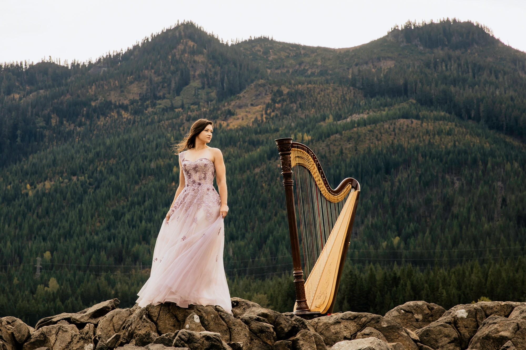 Portrait of a harpist in the Cascade Mountains by Seattle portrait photographer James Thomas Long Photography