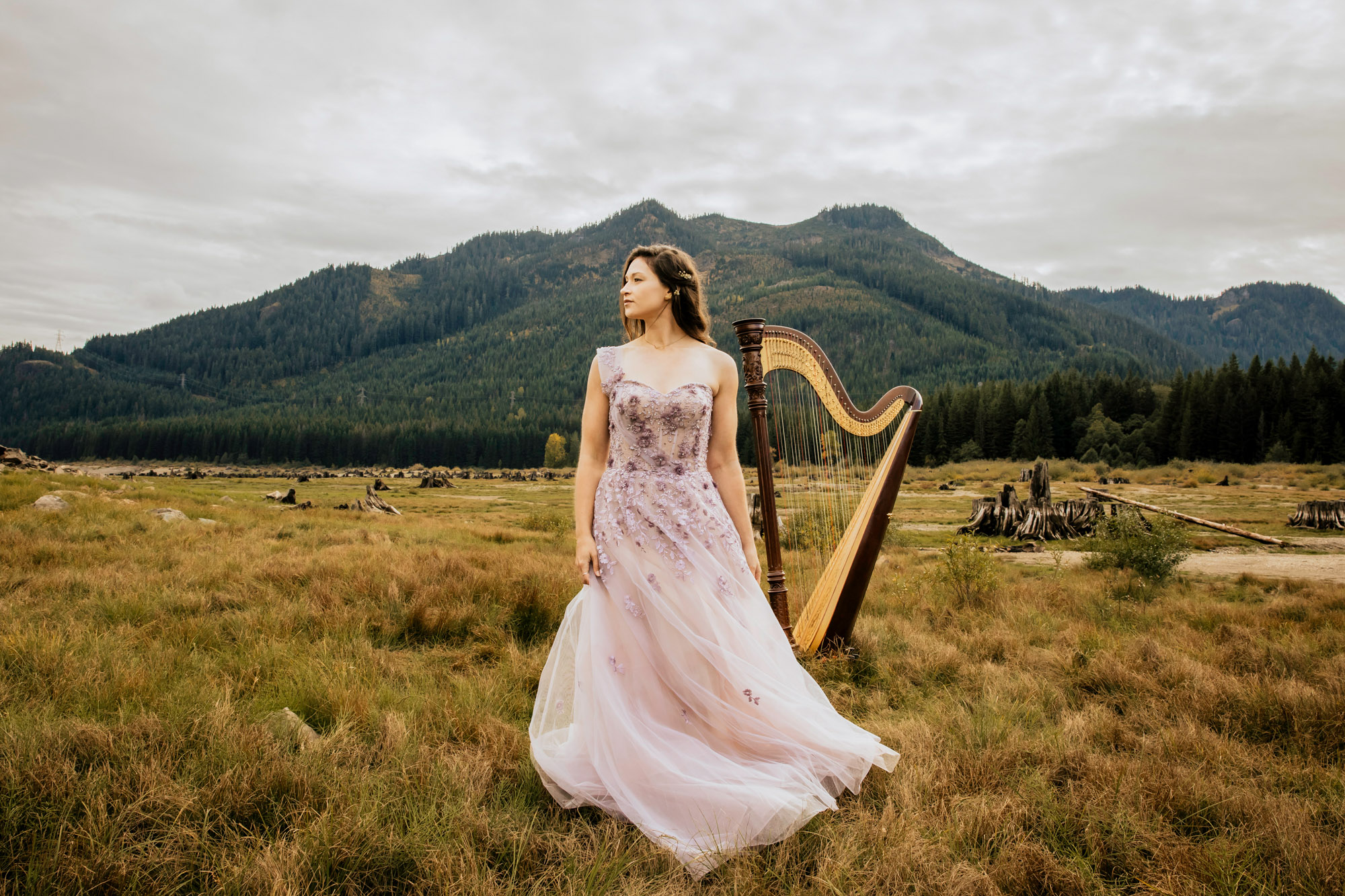 Portrait of a harpist in the Cascade Mountains by Seattle portrait photographer James Thomas Long Photography