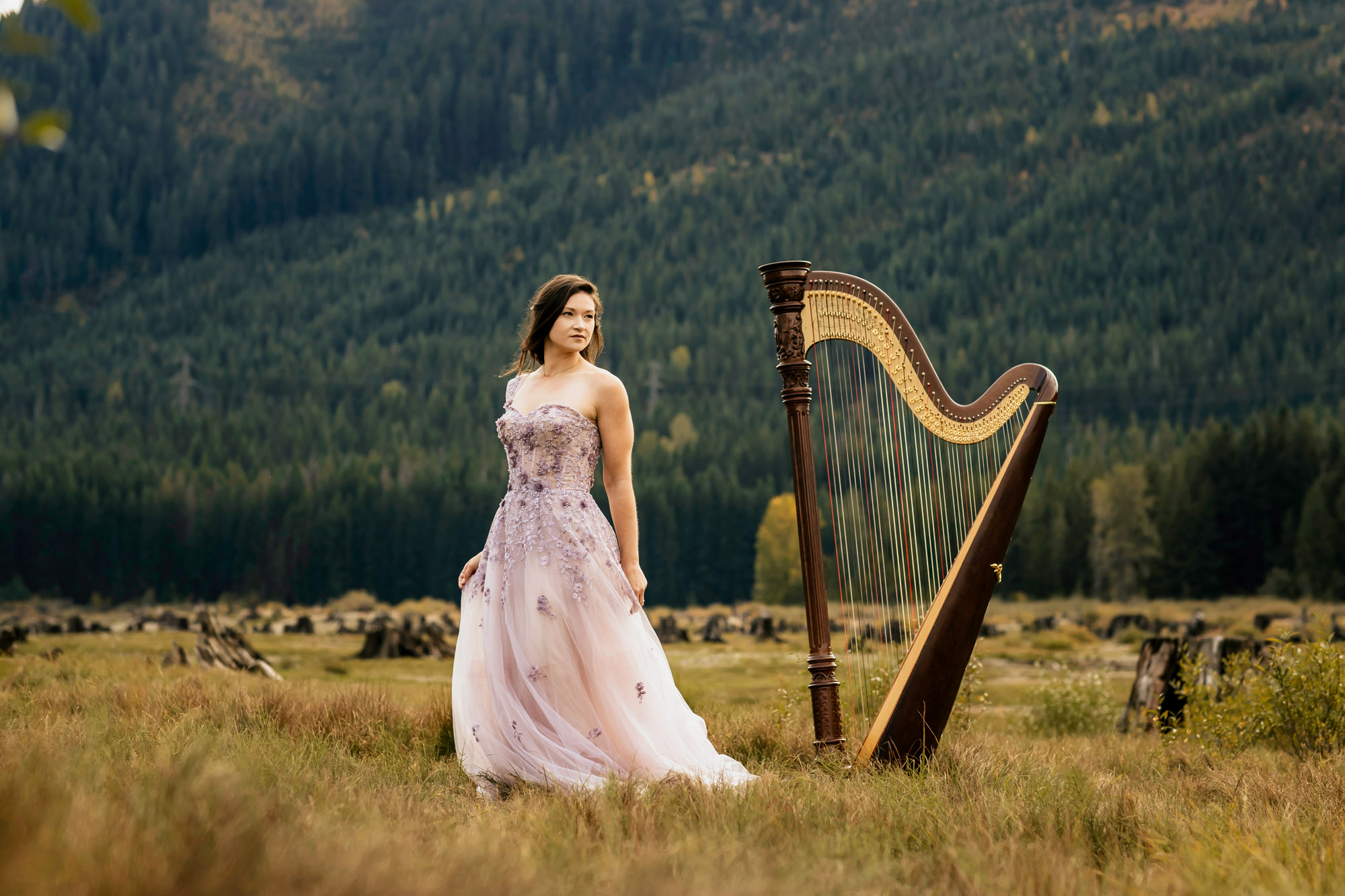 Portrait of a harpist in the Cascade Mountains by Seattle portrait photographer James Thomas Long Photography