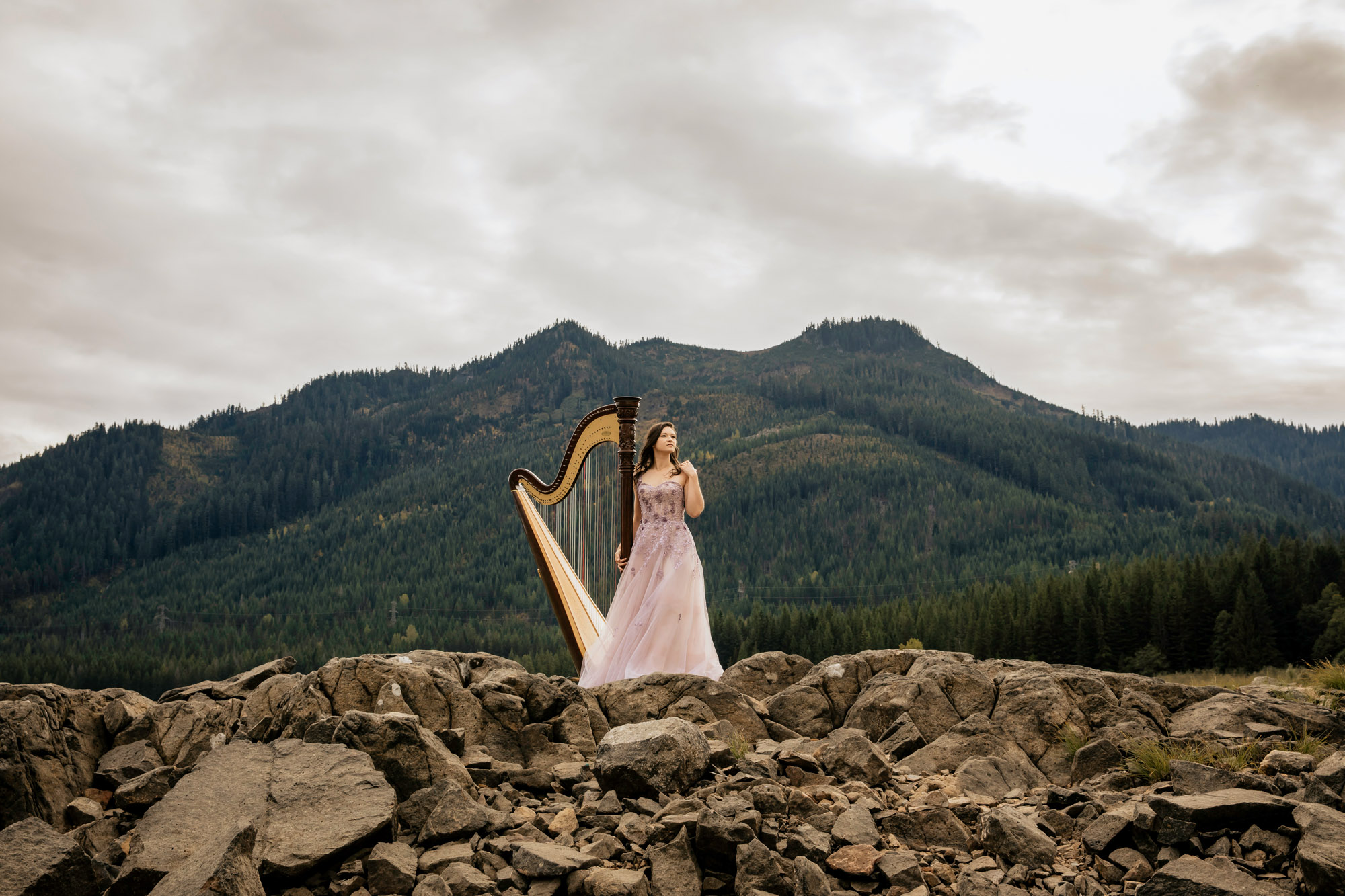 Portrait of a harpist in the Cascade Mountains by Seattle portrait photographer James Thomas Long Photography