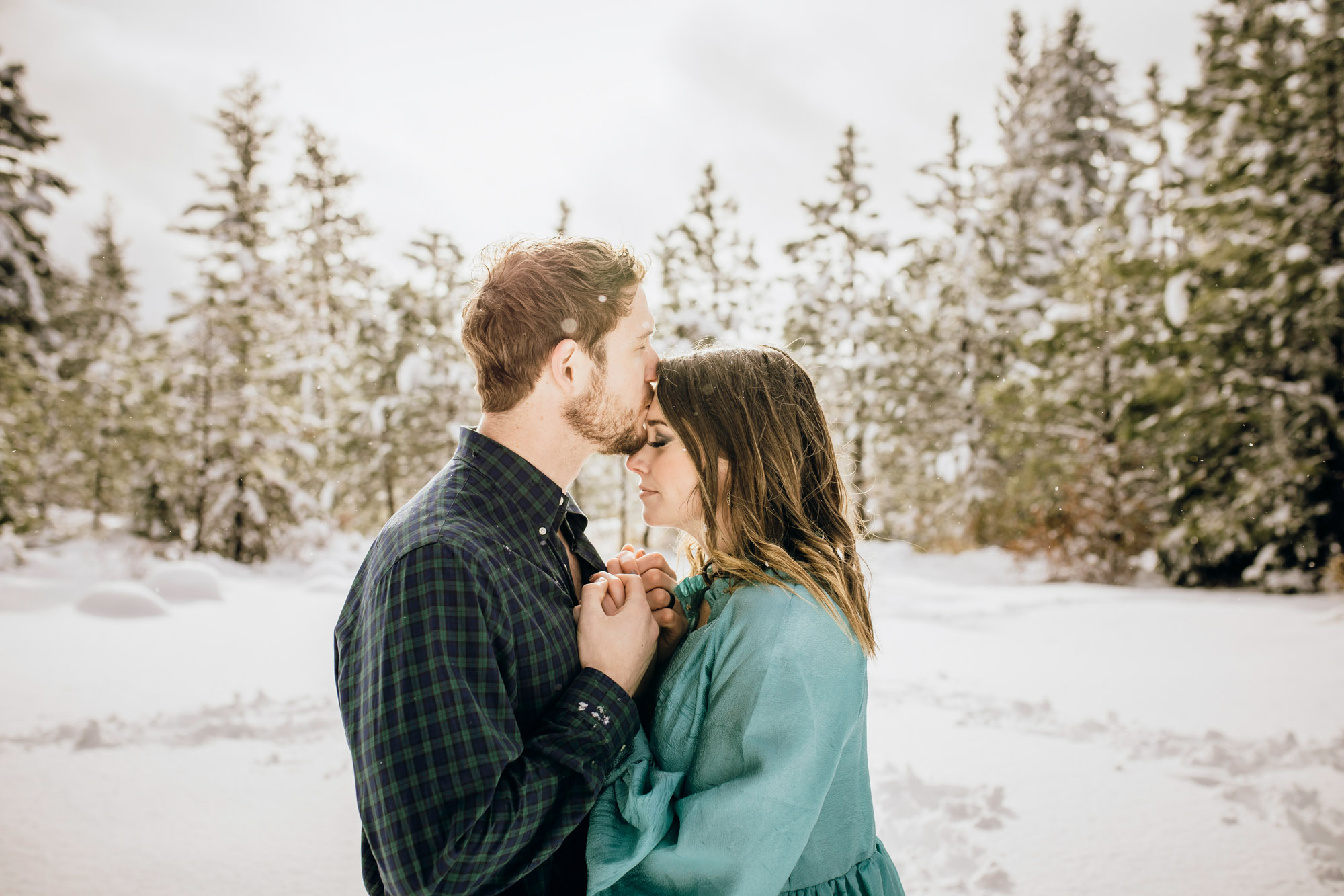 Adventure engagement session in the snow by Seattle wedding photographer James Thomas Long Photography