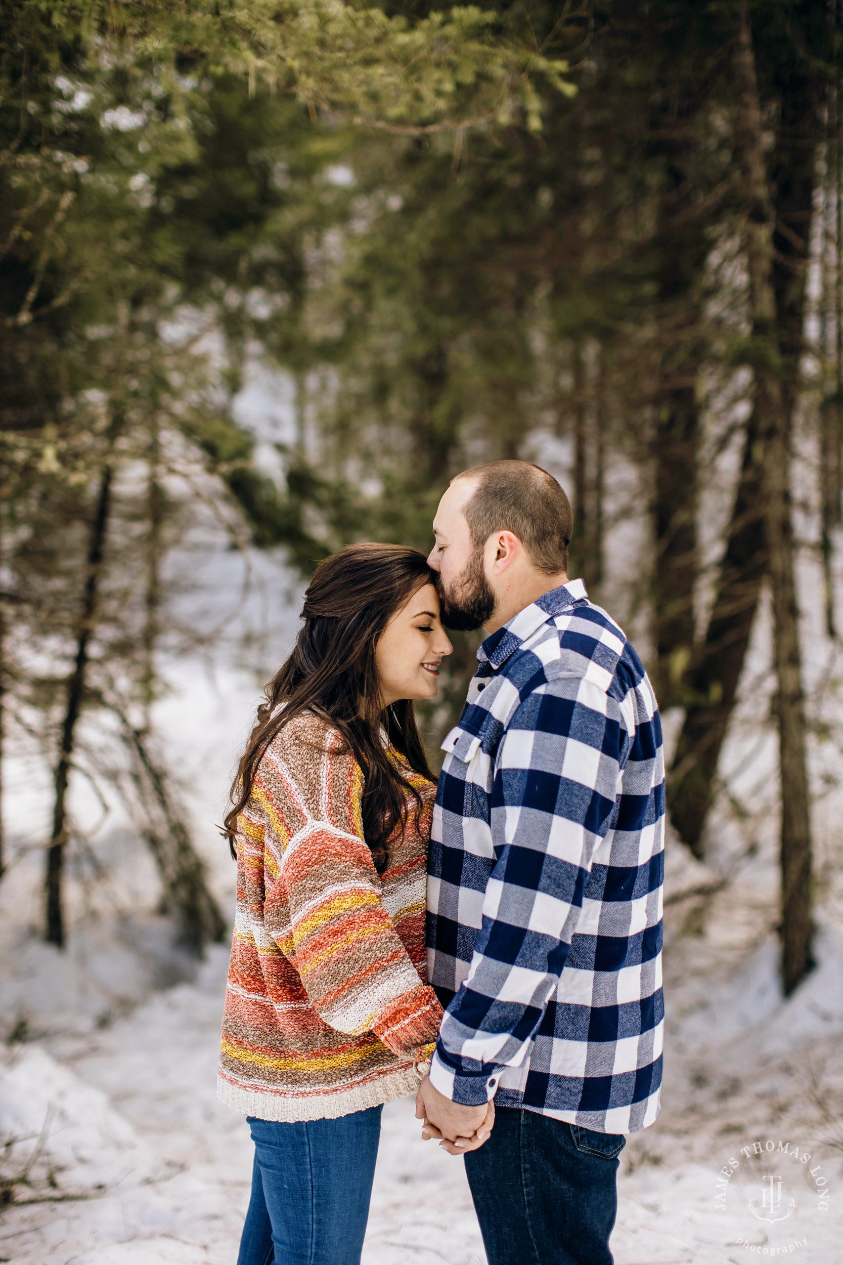 Cascade Mountain adventure engagement session in the snow by Snoqualmie wedding photographer James Thomas Long Photography