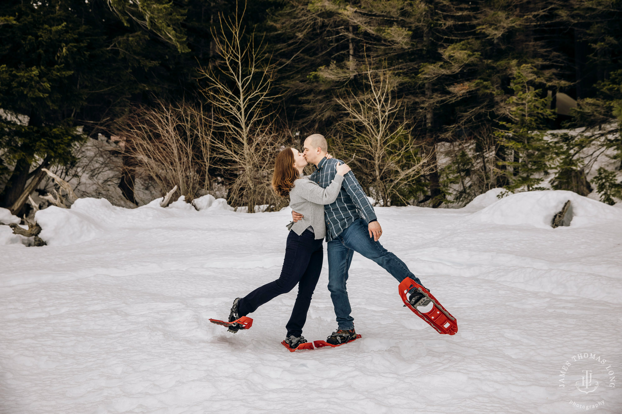 Cascade Mountain snowshoeing adventure engagement session in the snow by Snoqualmie wedding photographer James Thomas Long Photography