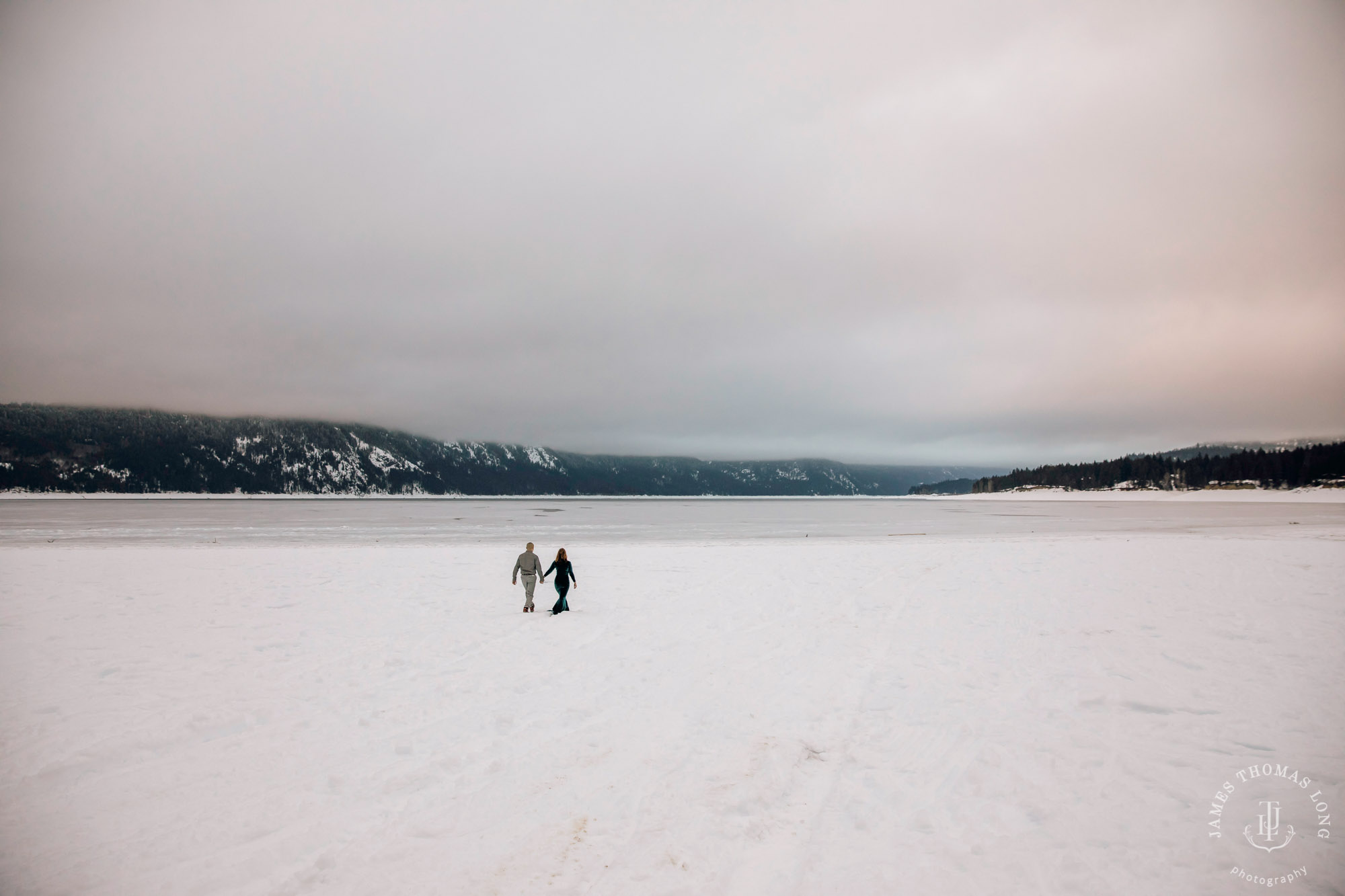 Cascade Mountain snowshoeing adventure engagement session in the snow by Snoqualmie wedding photographer James Thomas Long Photography