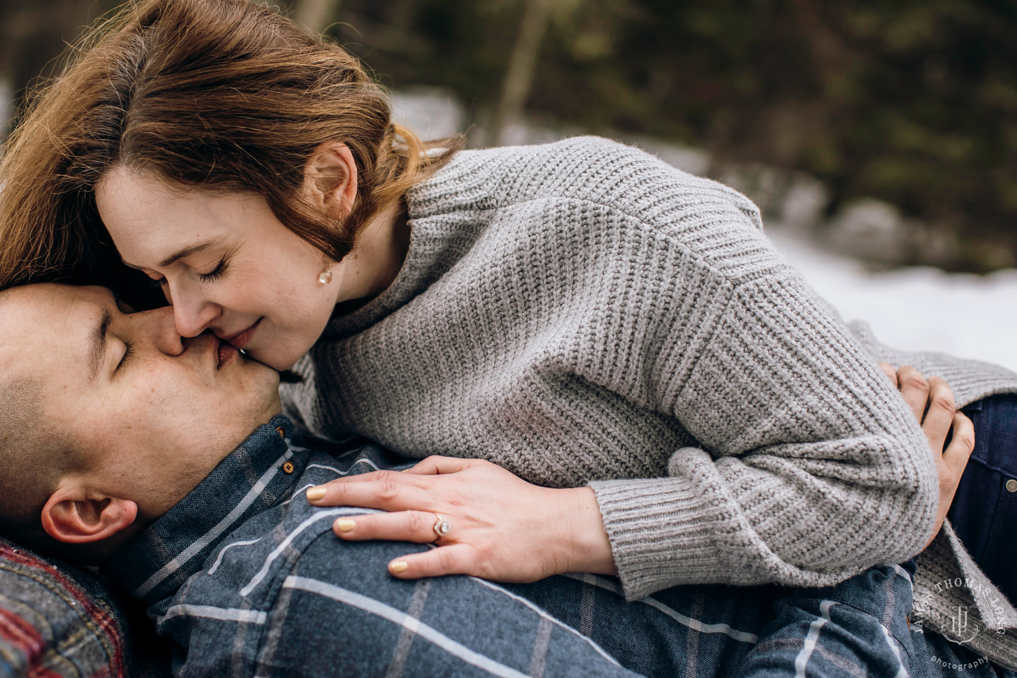 Cascade Mountain snowshoeing adventure engagement session in the snow by Snoqualmie wedding photographer James Thomas Long Photography