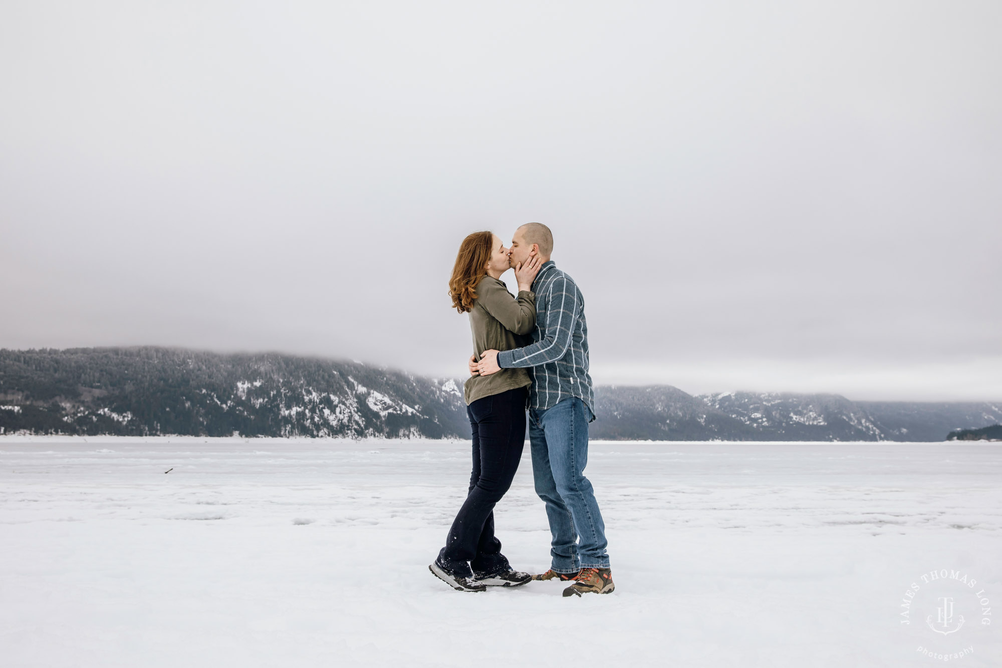 Cascade Mountain snowshoeing adventure engagement session in the snow by Snoqualmie wedding photographer James Thomas Long Photography