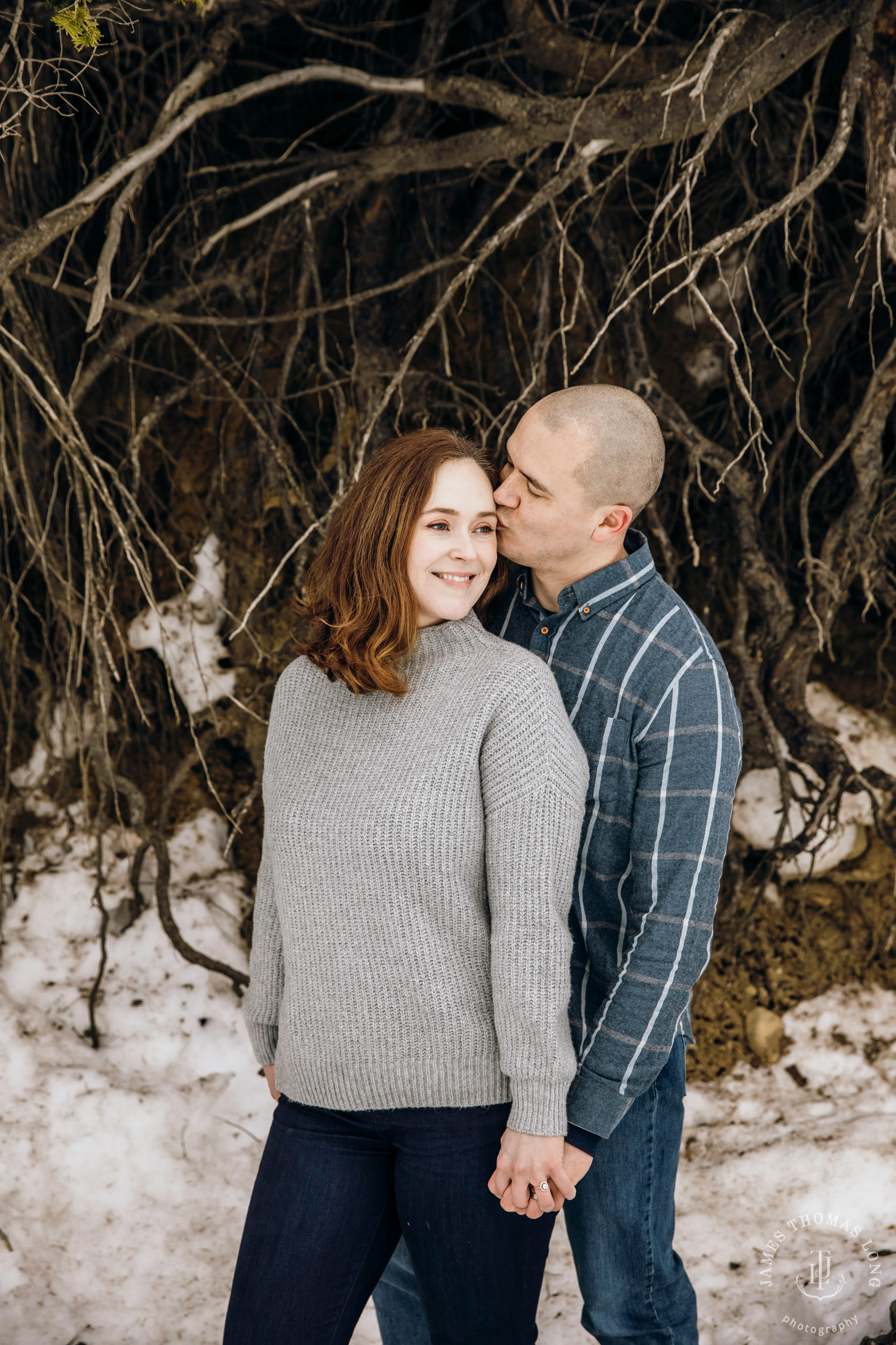 Cascade Mountain snowshoeing adventure engagement session in the snow by Snoqualmie wedding photographer James Thomas Long Photography